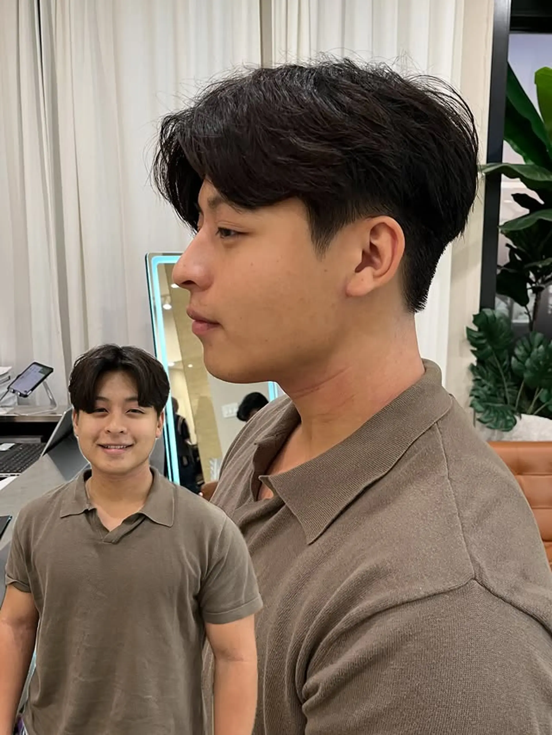 A contemporary bowl cut with a smooth, tapered fade. 1