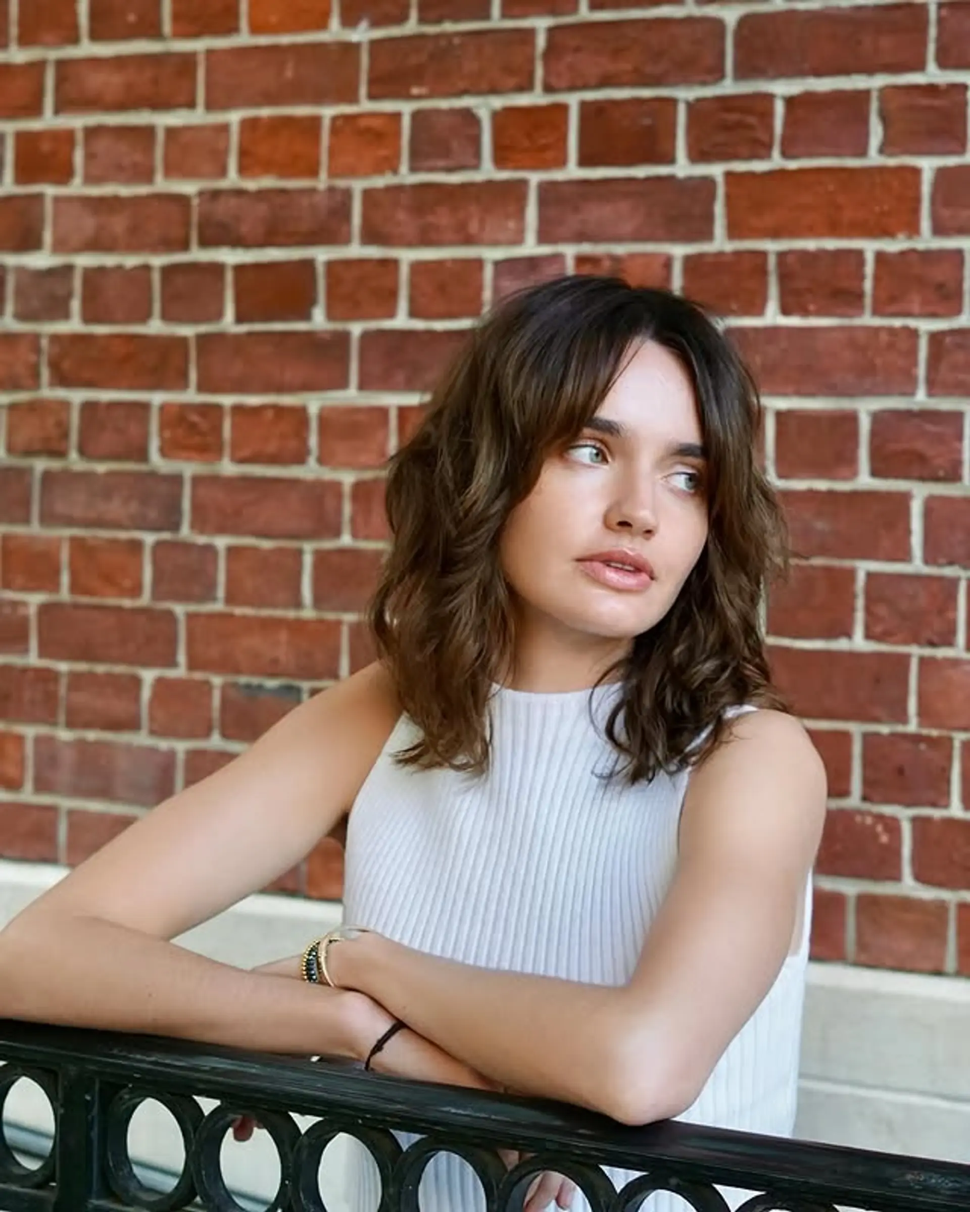 A shaggy lob (long bob) with face-framing bangs and layers. 1