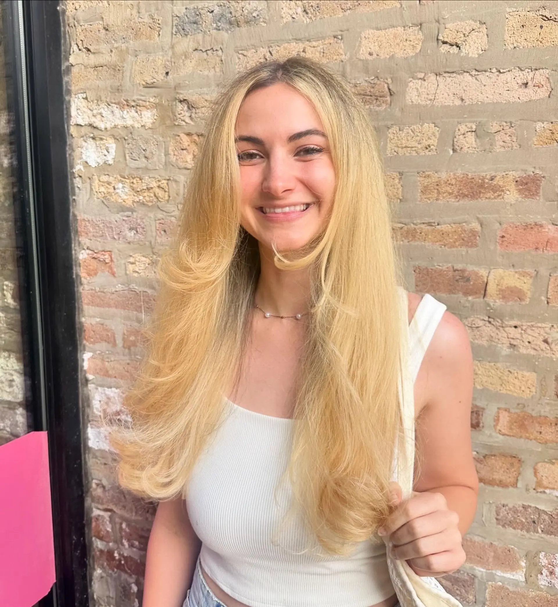 This hairstyle features long, straight hair with subtle layering to create movement and a soft, natural shape. 2