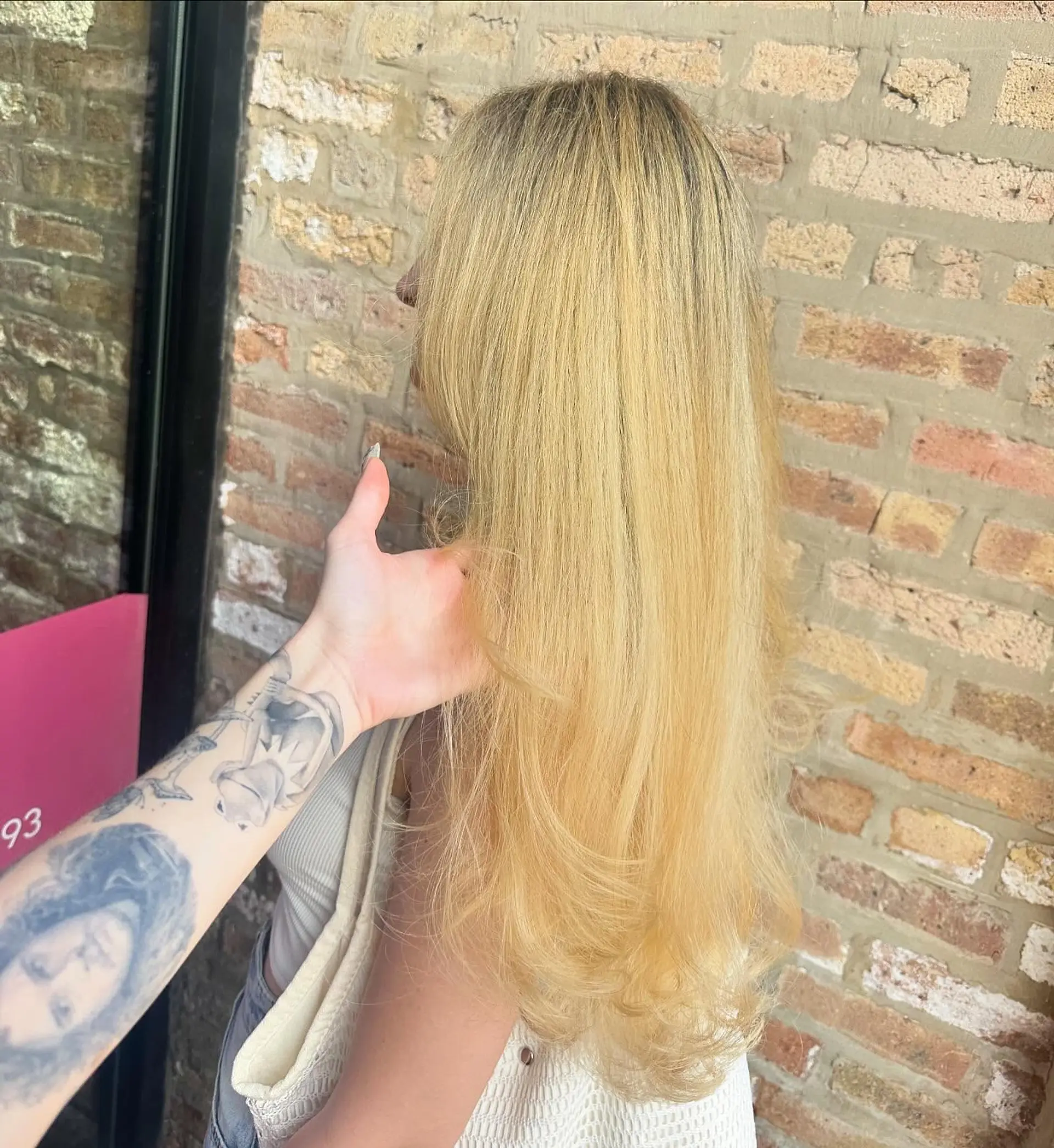 This hairstyle features long, straight hair with subtle layering to create movement and a soft, natural shape. 3