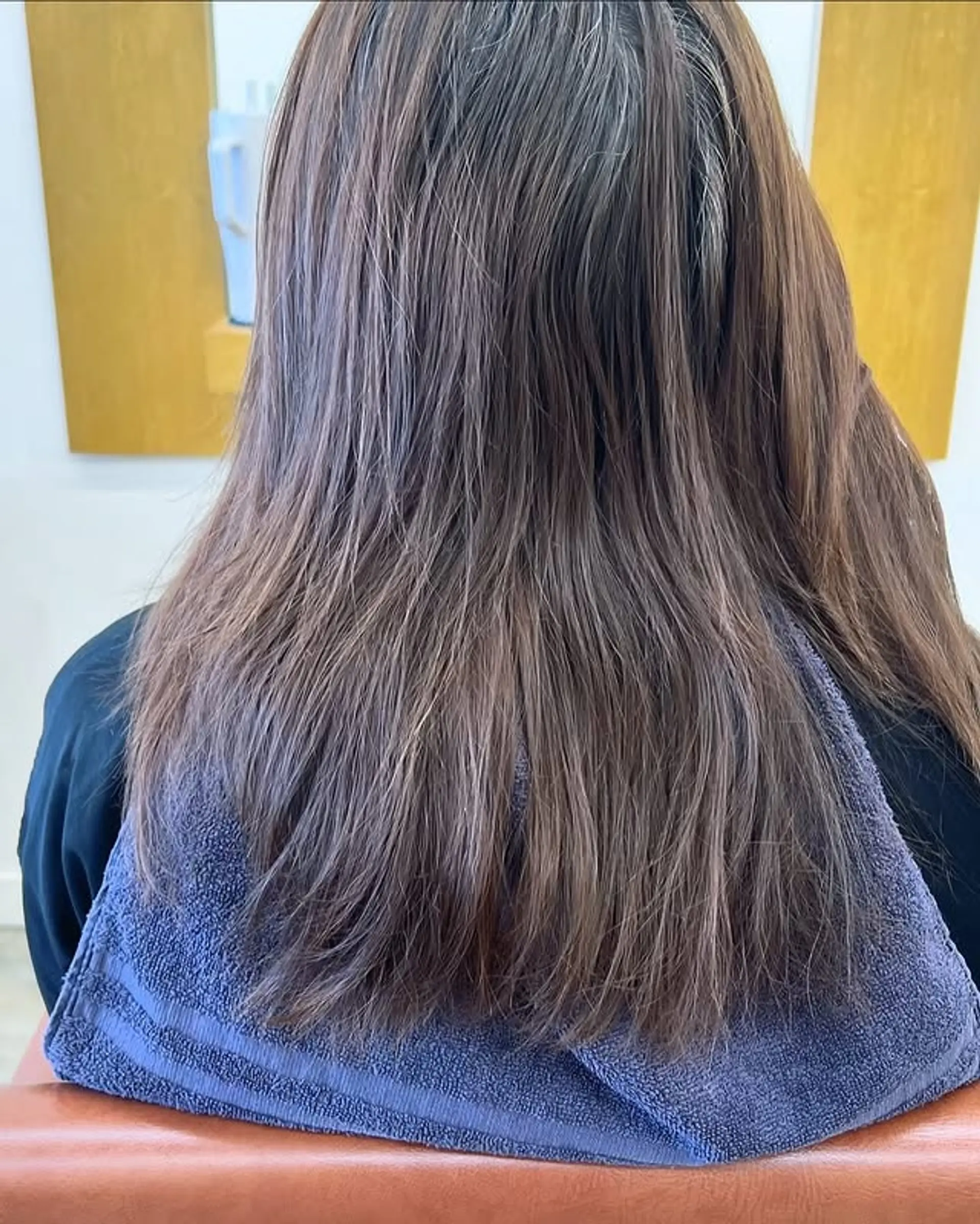 A long layered haircut for straight hair. 1