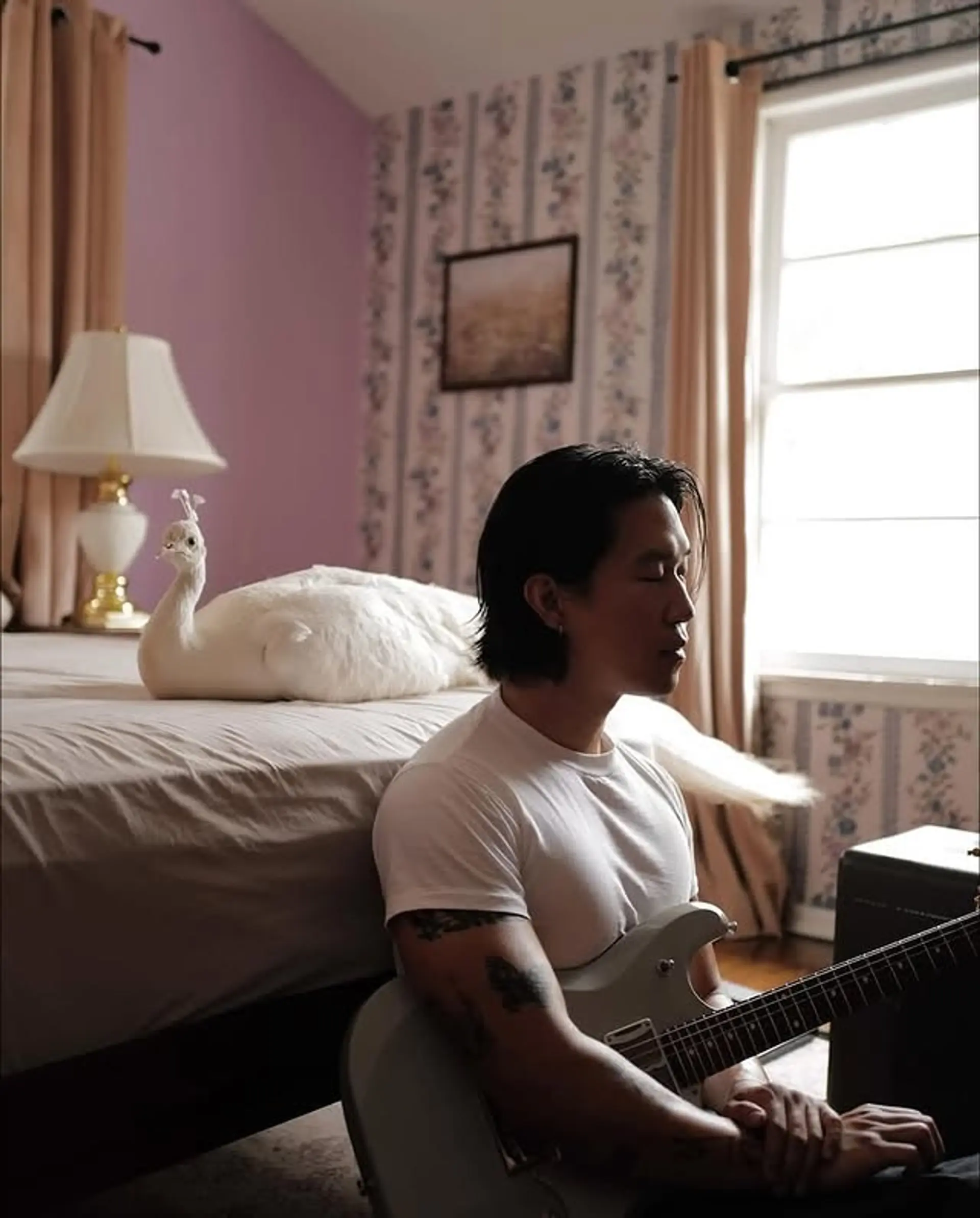 A sleek, medium-length hairstyle with a clean center part. 1