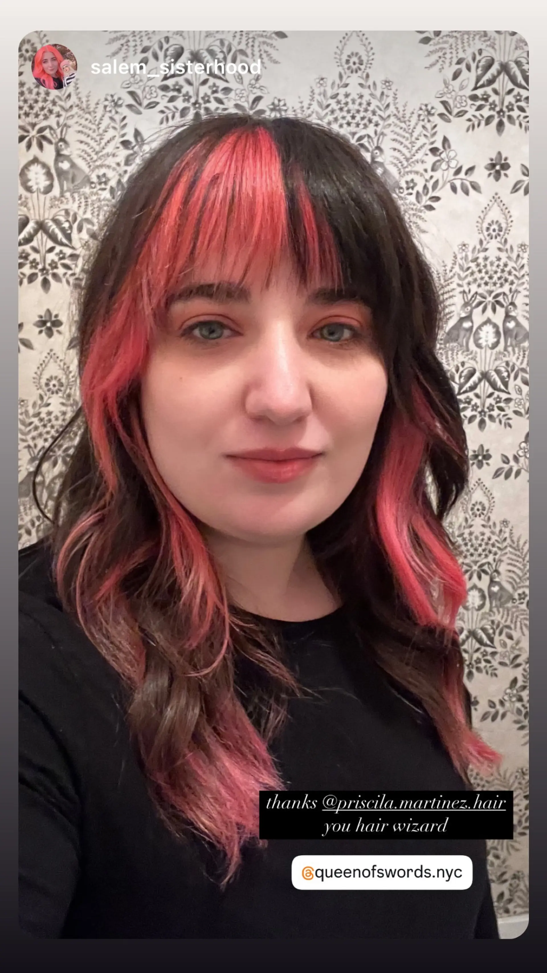 Wavy medium length hair with face-framing pink peekaboo highlights and blunt bangs. 1