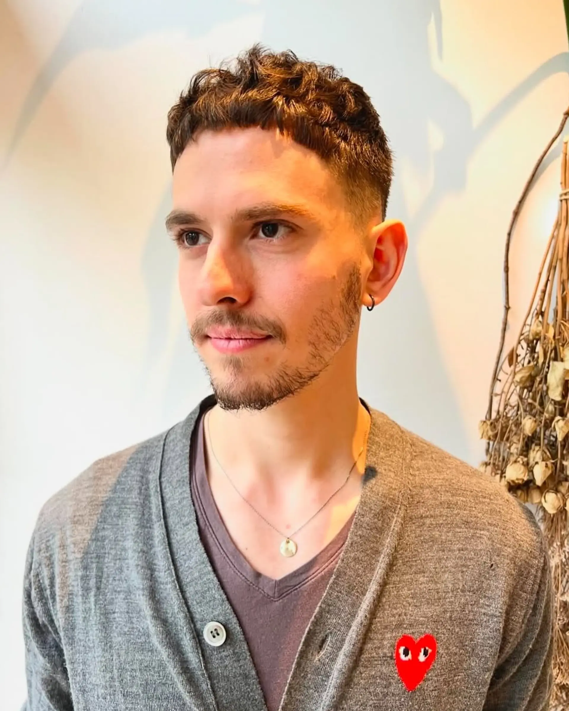 A short, textured crop with a short, blunt fringe. 2