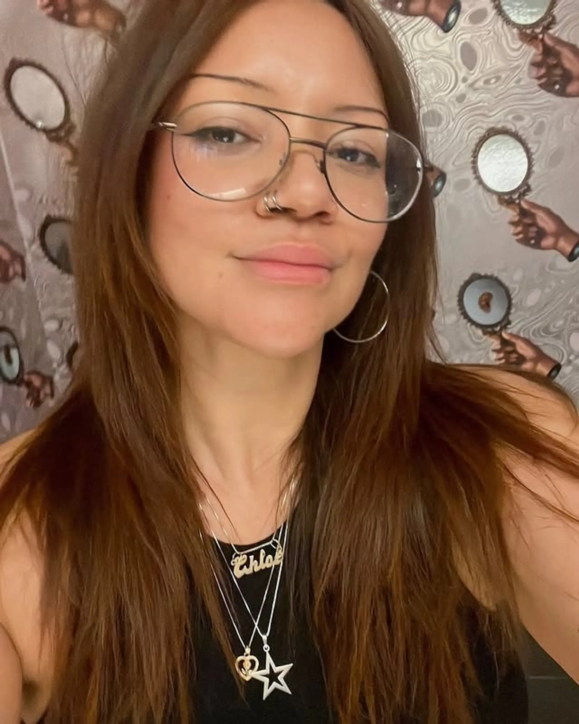 Long, straight brunette hair with subtle layers. 1