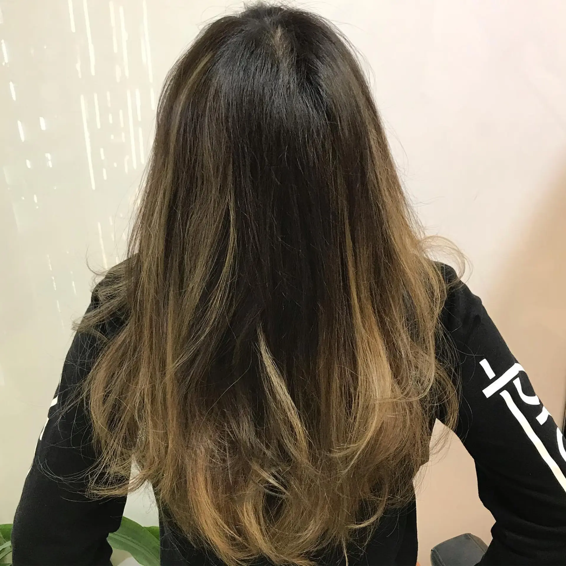 Bronde ombre with soft waves and face-framing curtain bangs. 2