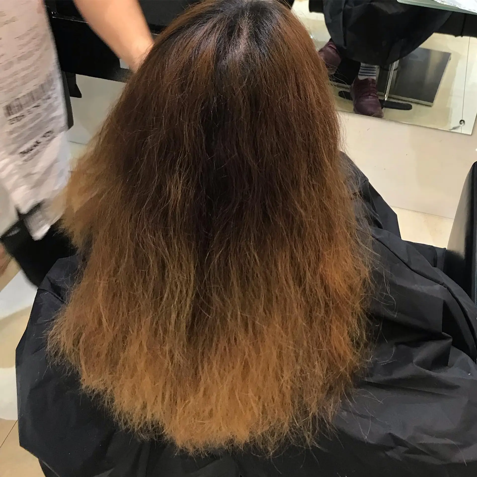 Bronde ombre with soft waves and face-framing curtain bangs. 3