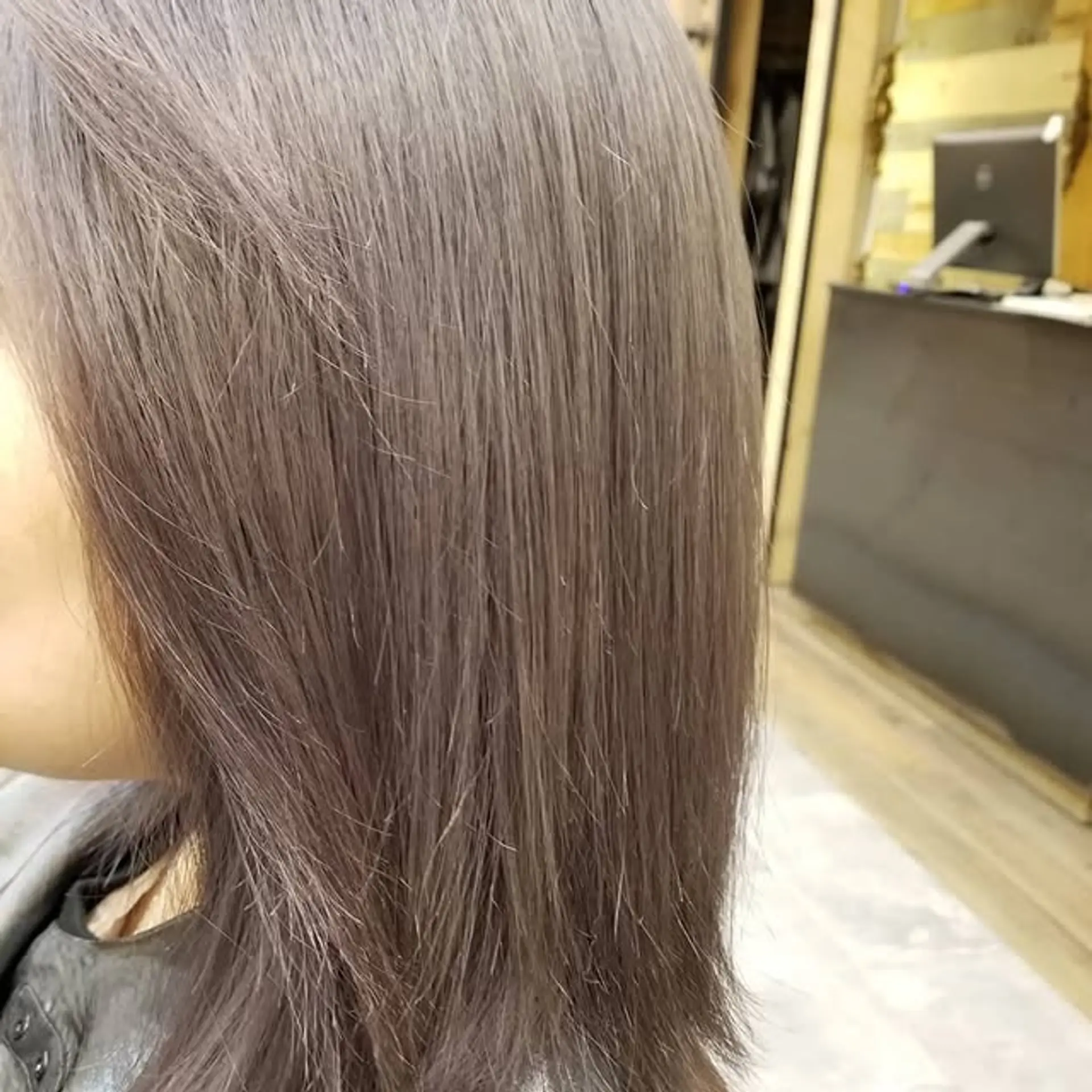 Medium length straight hair with an ash brown color and layered cut. 1
