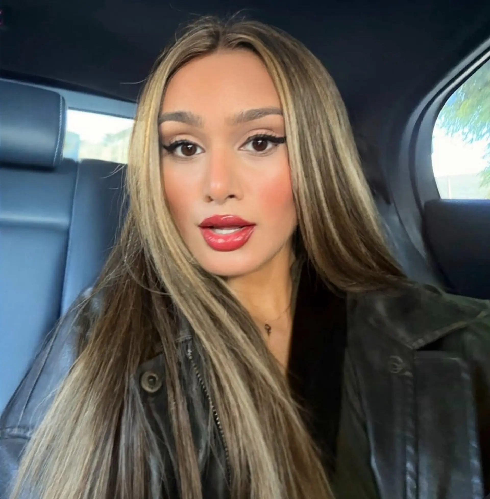 Long straight bronde hair with bright blonde face-framing highlights and dimensional lowlights. 1