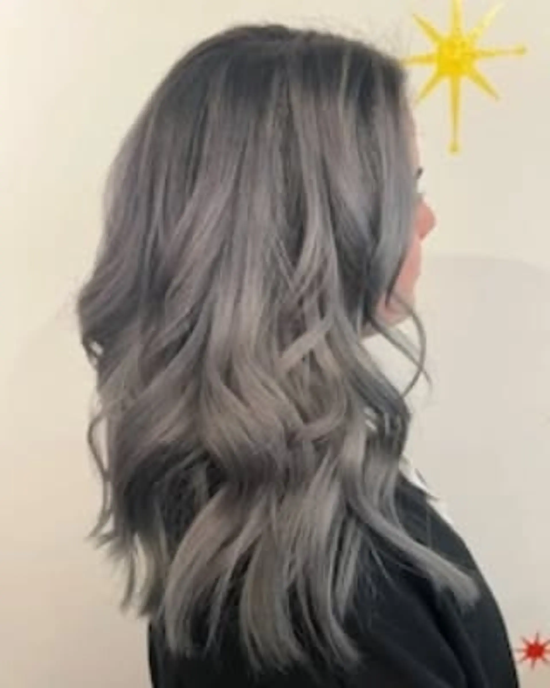 Long wavy hair with a smokey silver ombre. 1