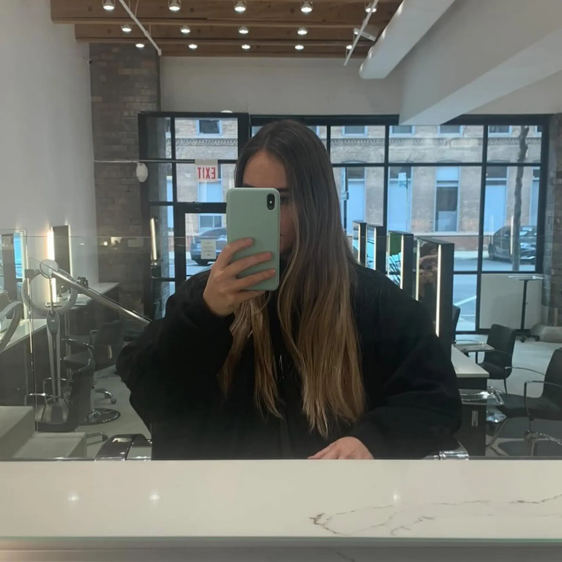 Long, wavy hairstyle with a blonde balayage and face-framing layers. 2