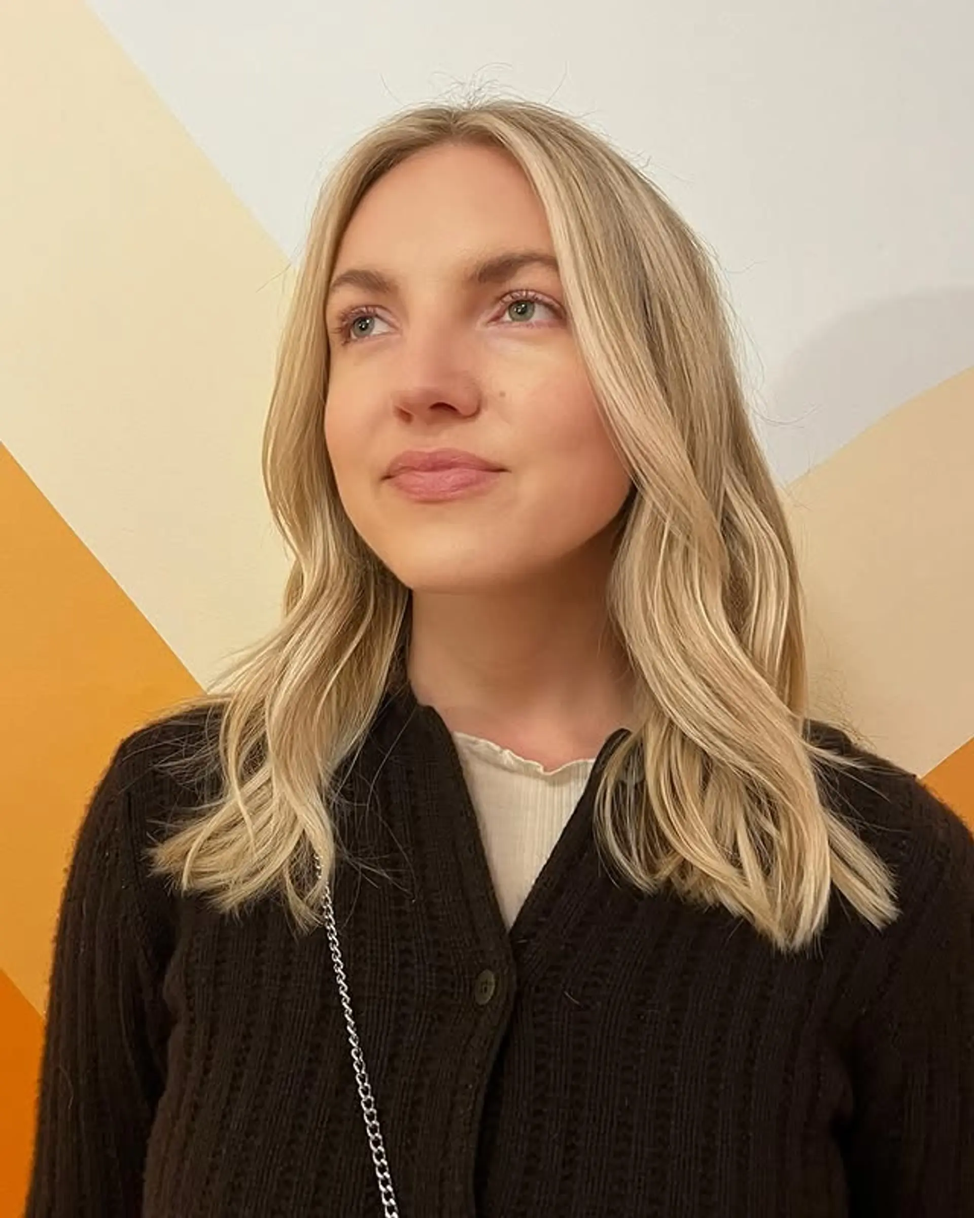 Beachy blonde waves with a balayage effect and face-framing layers. 1