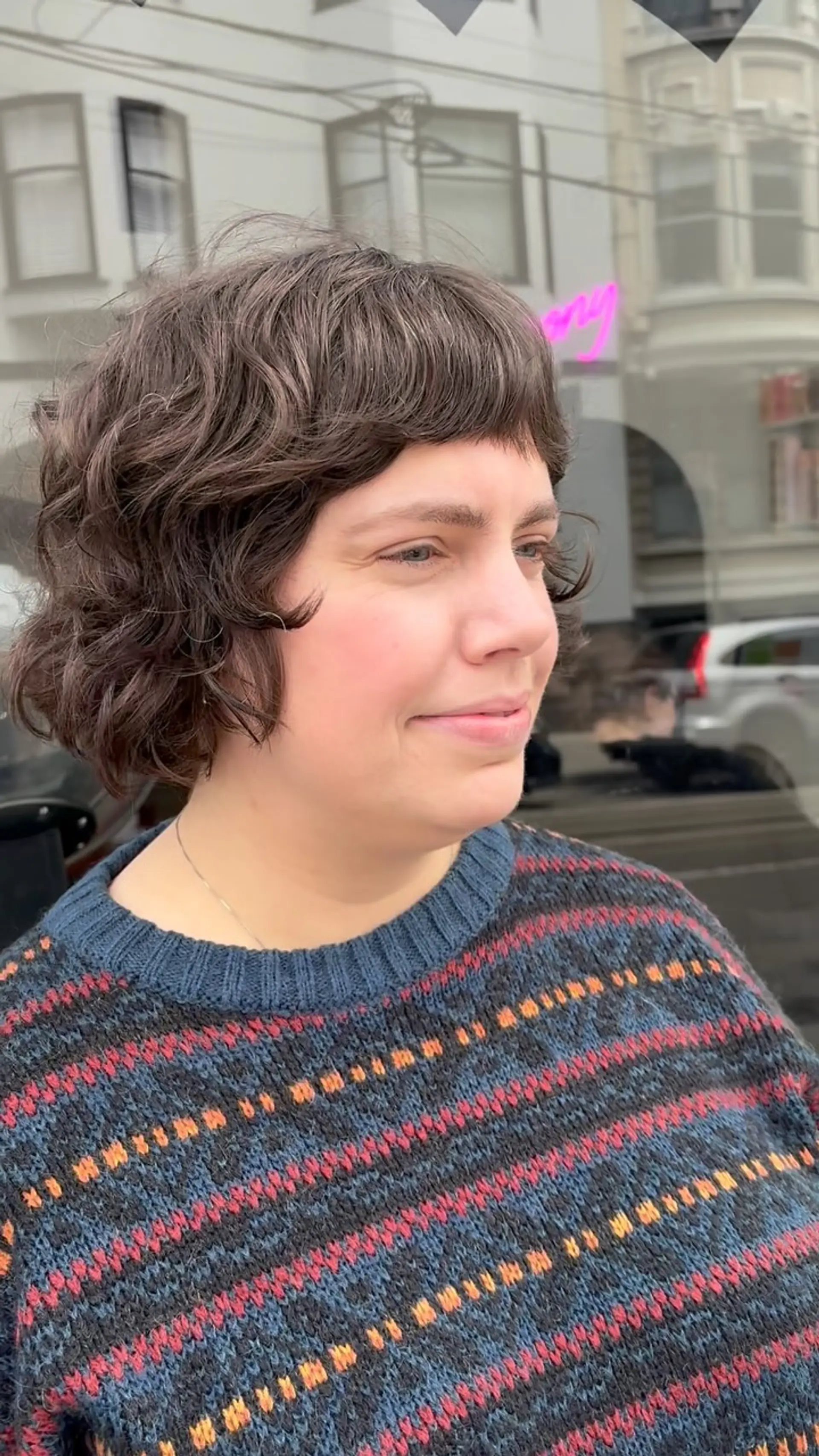 A textured wavy French bob hitting at the jawline, paired with cropped micro bangs. 1