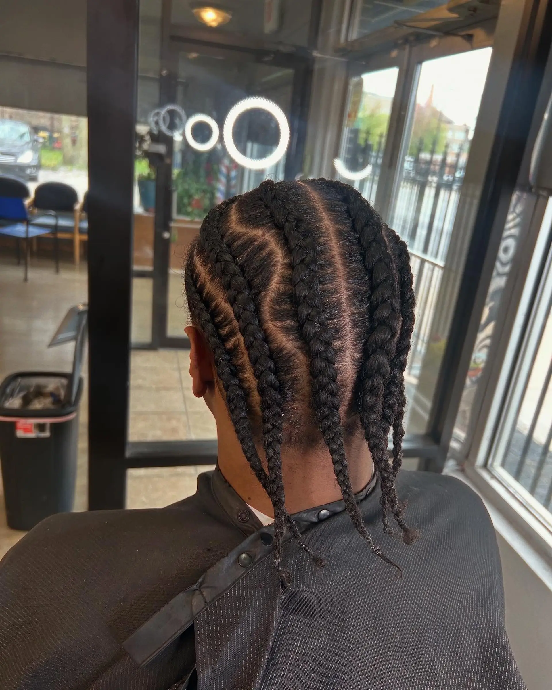 Short cornrow braids with a taper fade. 2