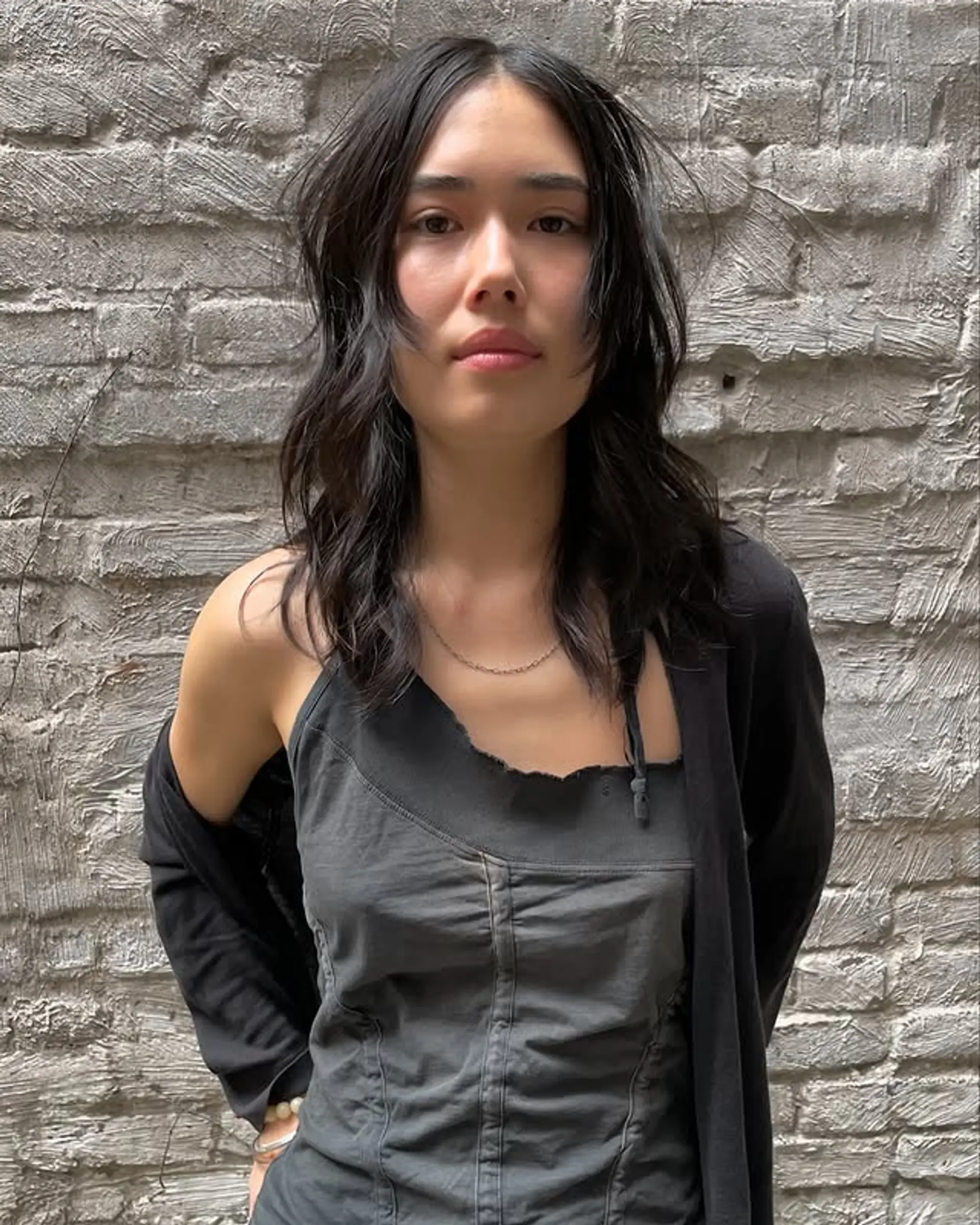 Choppy layered medium-length shag with curtain bangs. 1