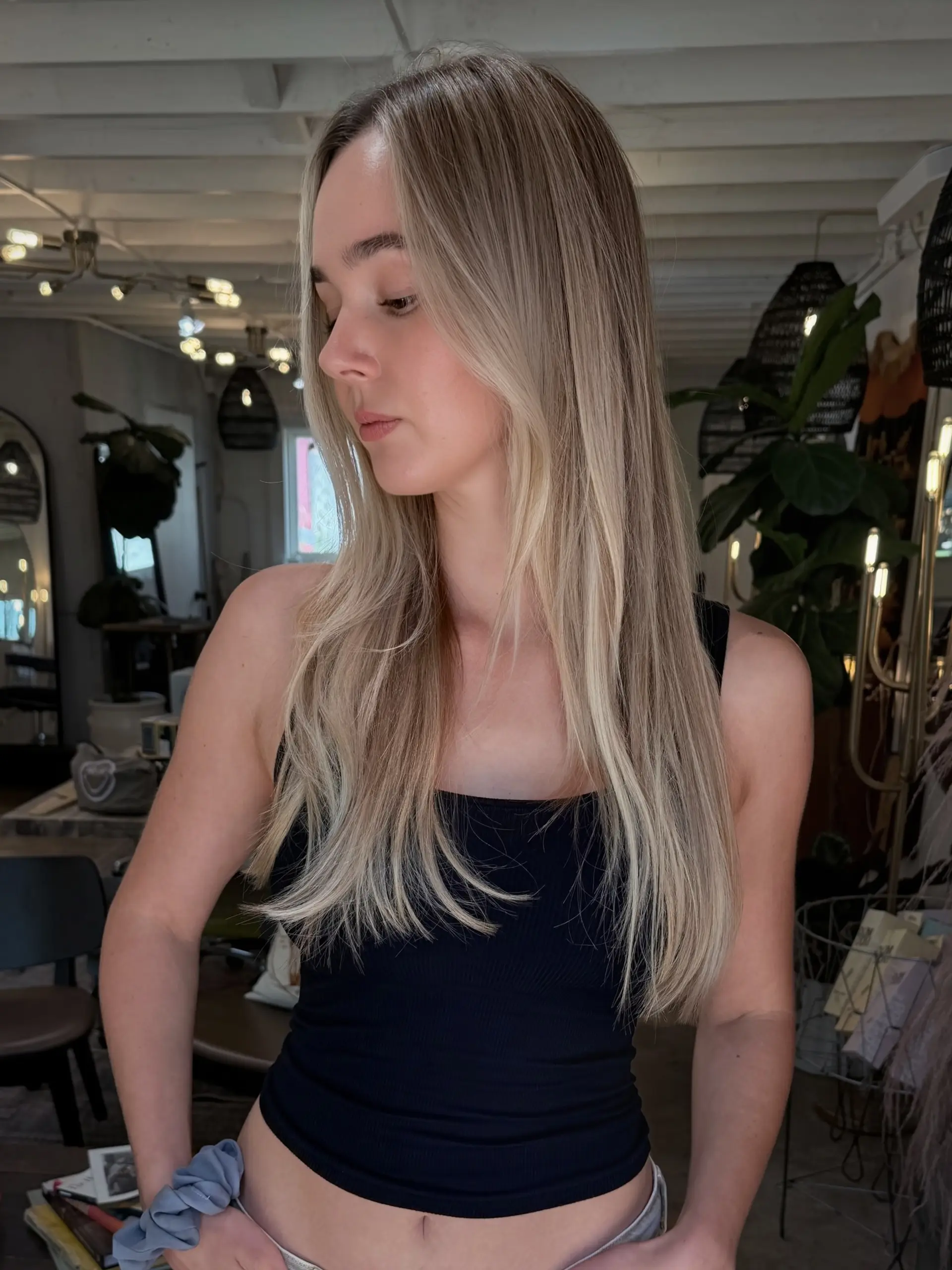 Long straight hair featuring multi-dimensional blonde foil highlights and subtle face-framing layers. 1