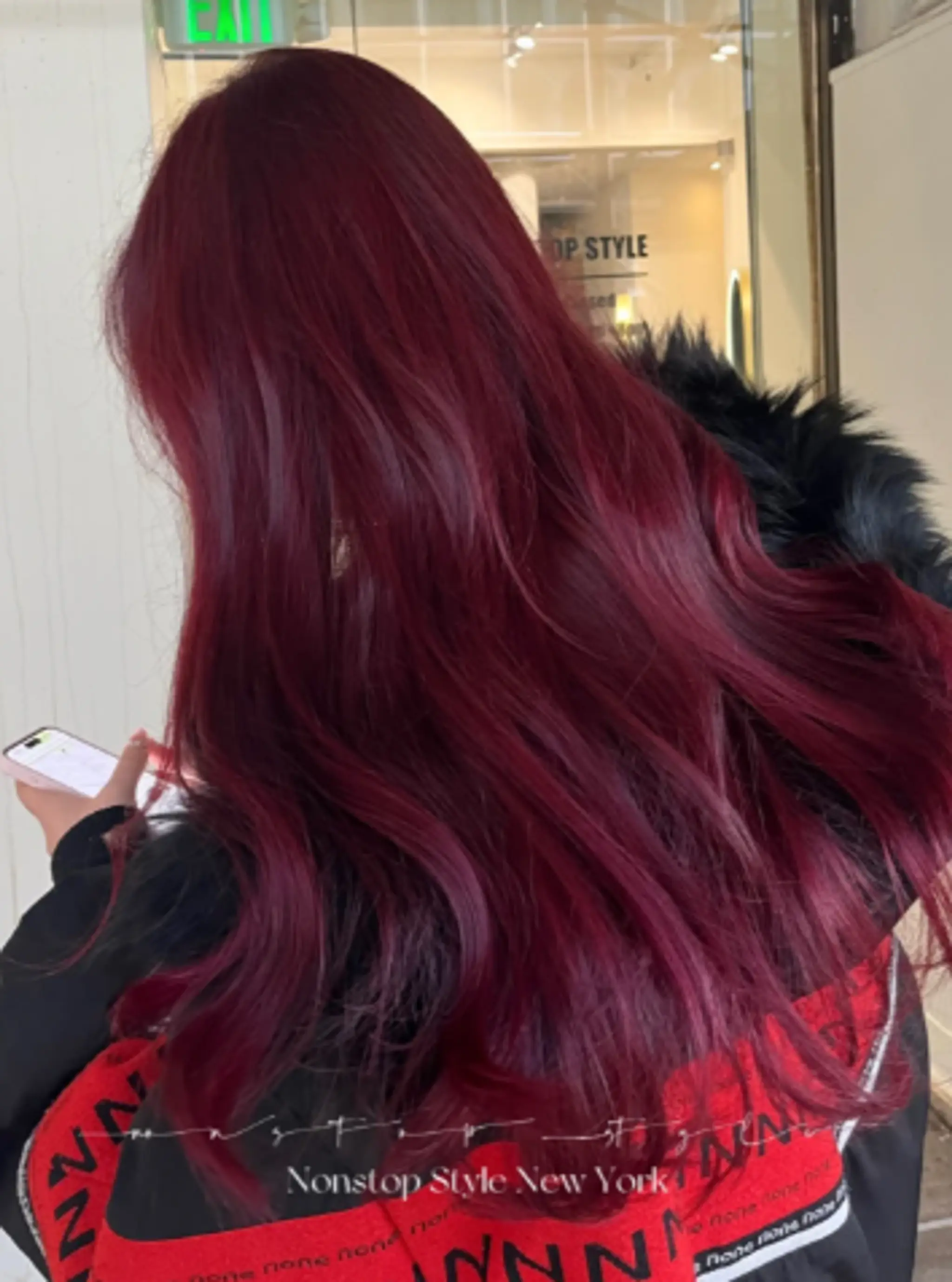 Very long, wavy hair colored in a rich, deep red shade. The hair cascades down in soft waves, giving a voluminous and elegant appearance.
(NonstopStyle: by Neil)
