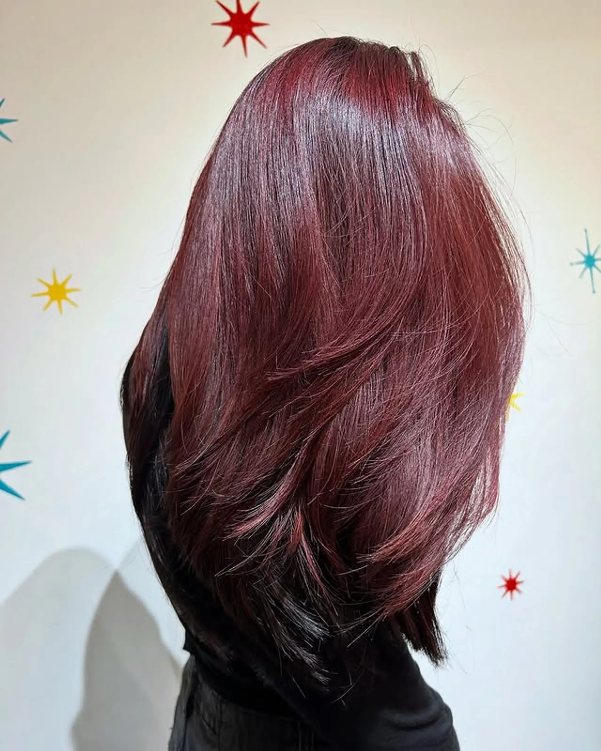 A long layered hairstyle with a color melt. 1