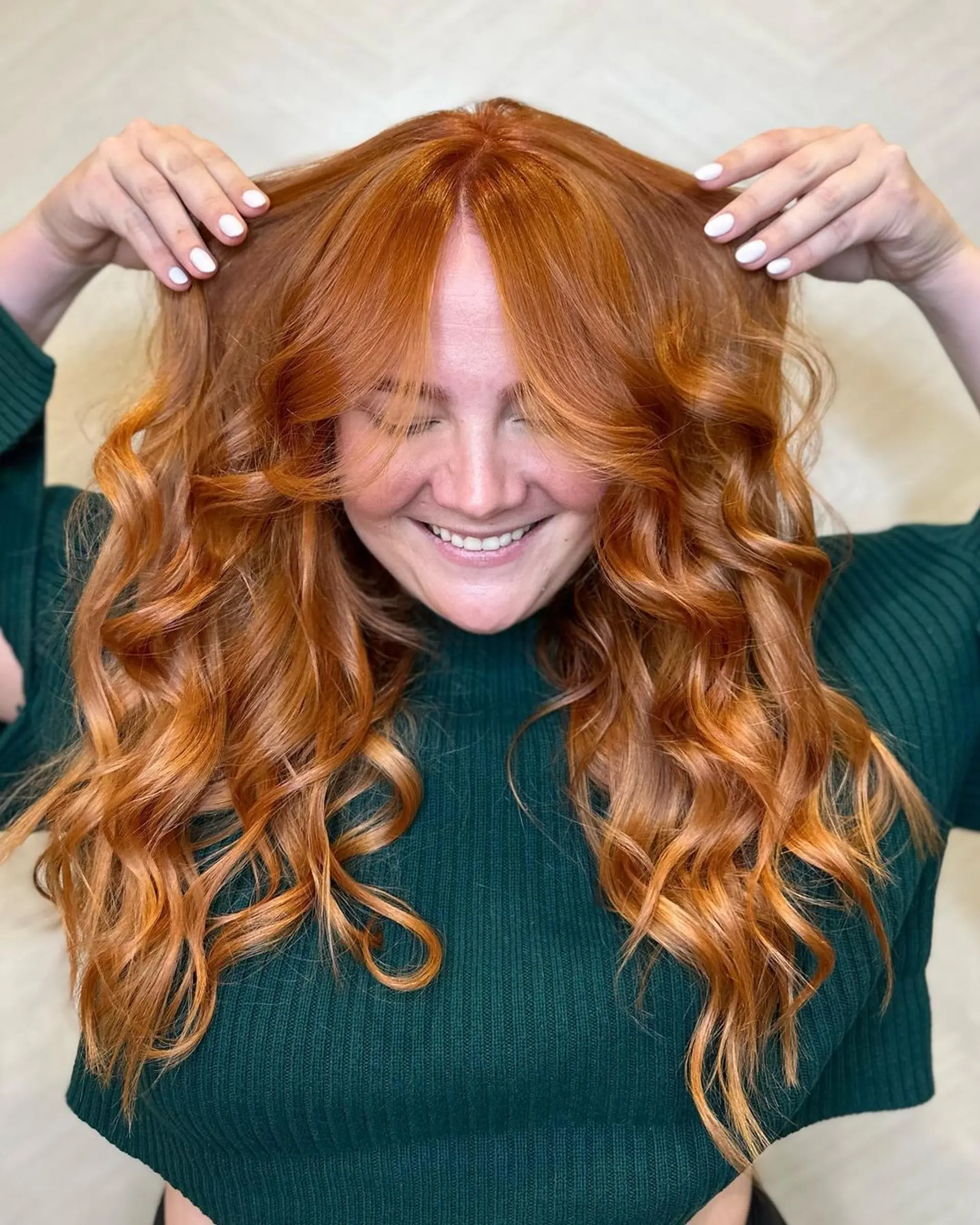 Very long, copper-colored hair with voluminous waves and loose curls, featuring layered cuts and golden highlights for added dimension.

Color by @simabeautynyc
Cut and style by @juliamannino_hair
 3