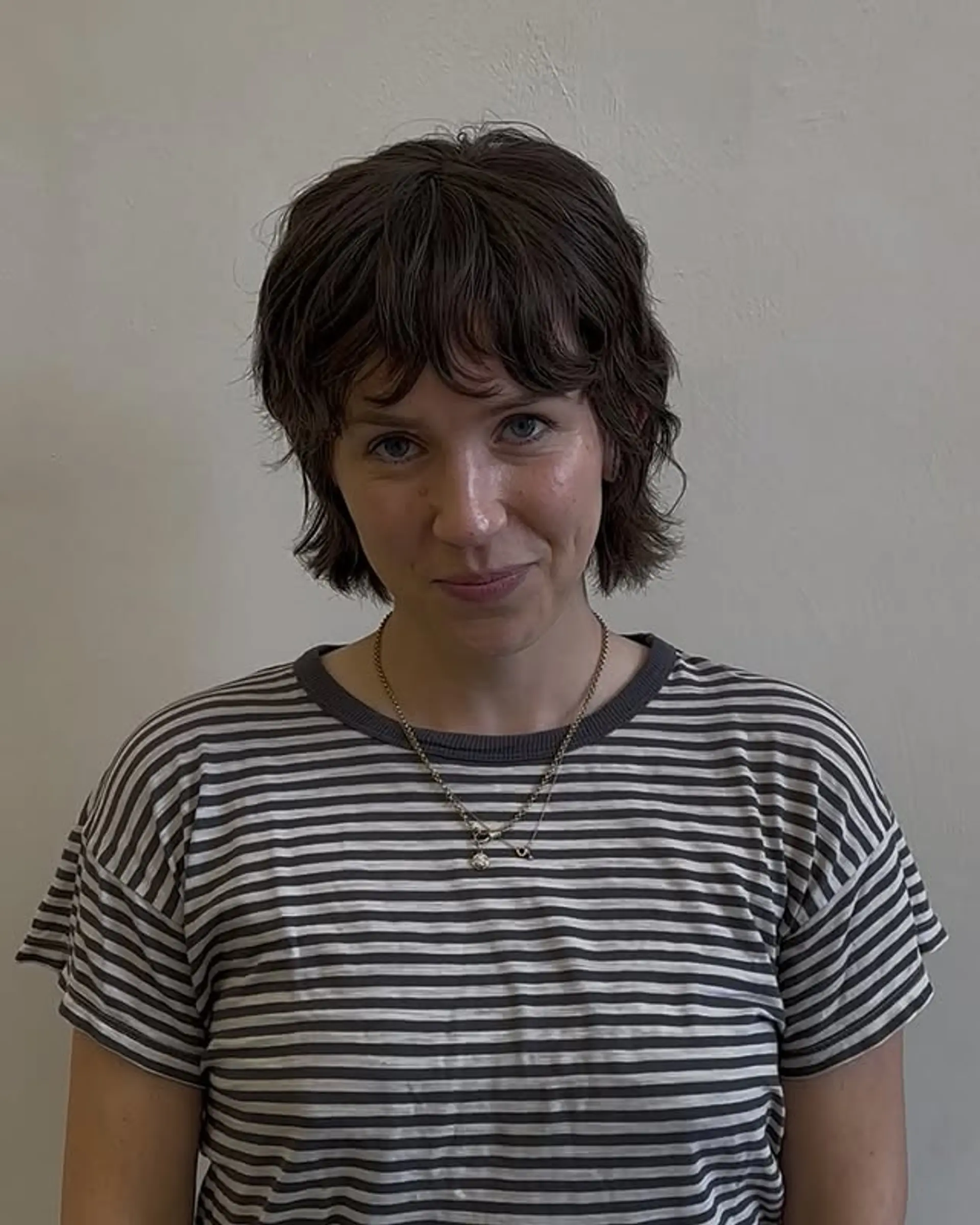 A short, choppy shag with baby bangs and textured ends. 1