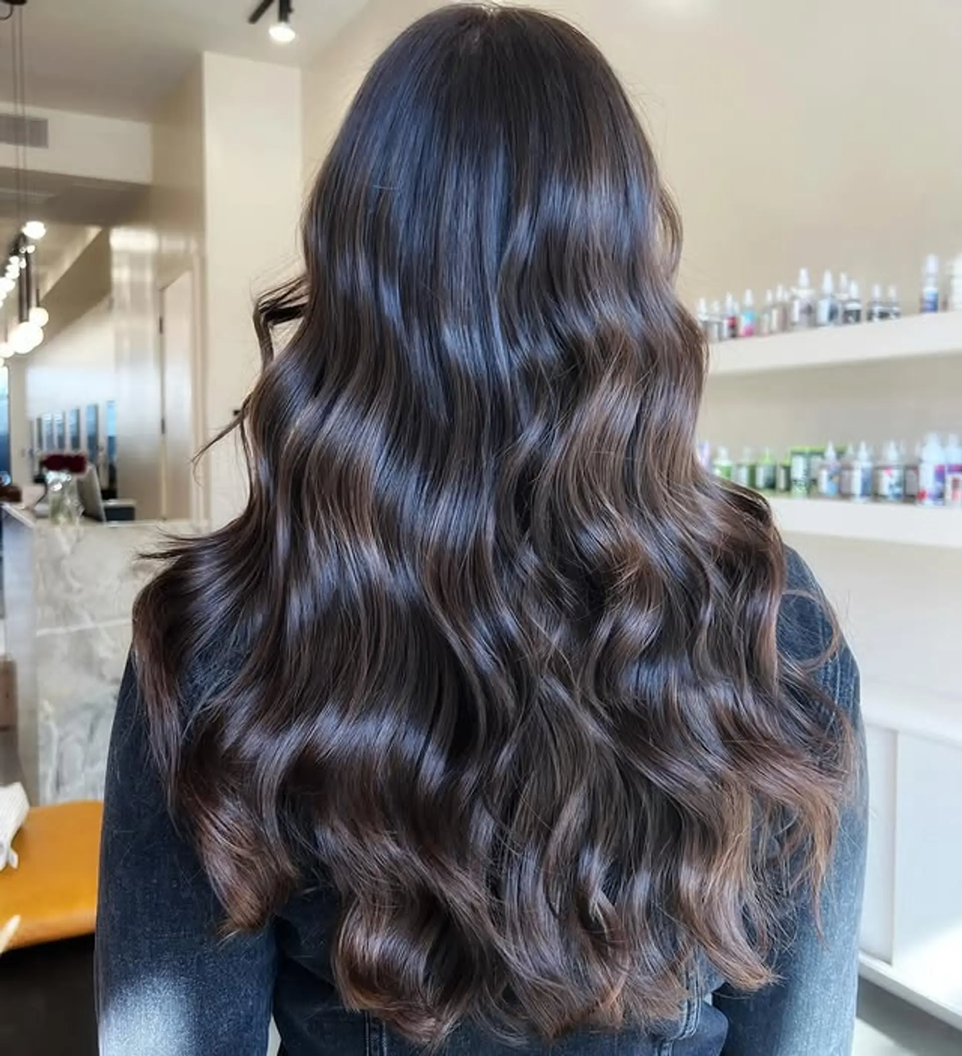 Long, soft waves with a glossy finish. 1