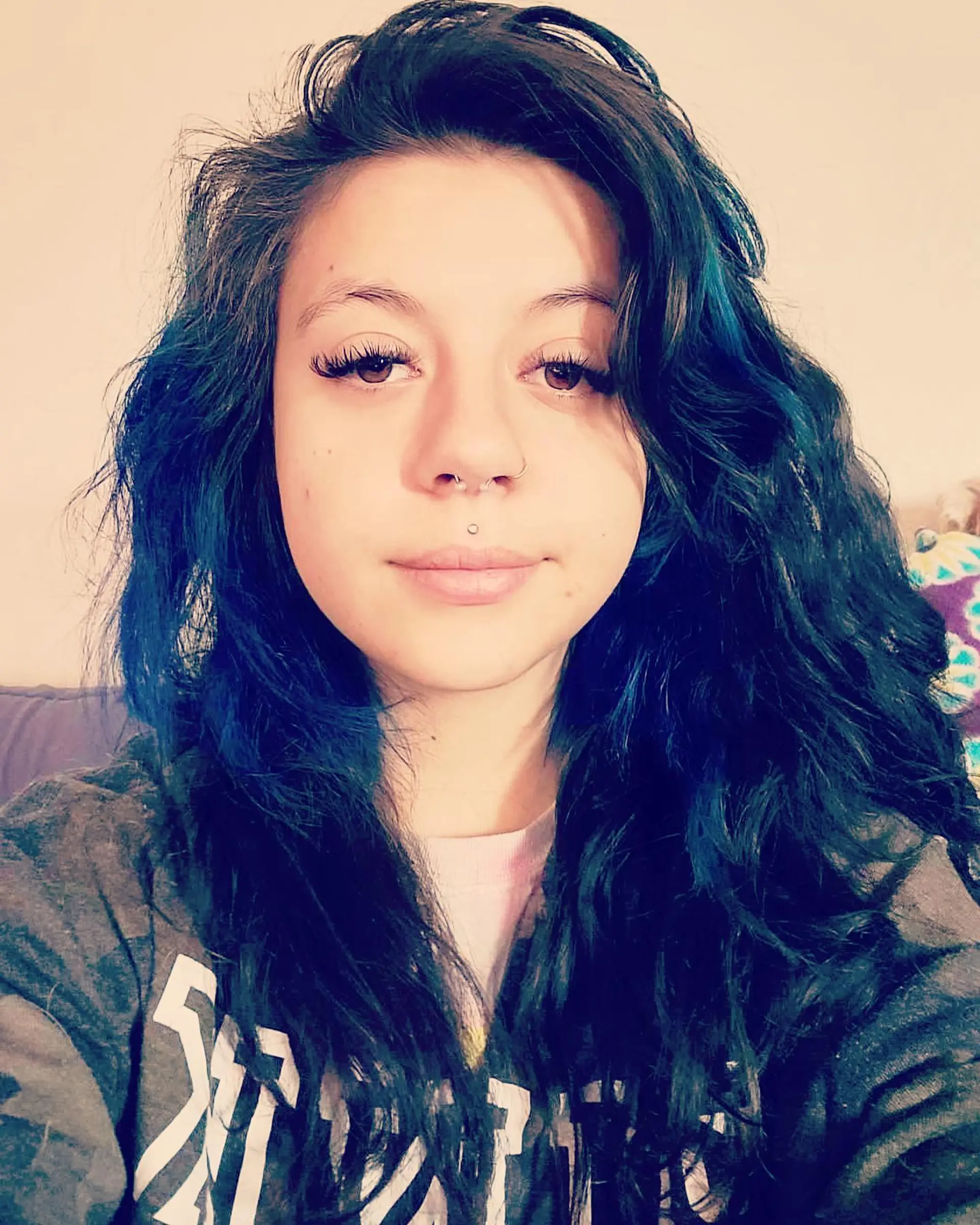 Long, tousled wavy hair featuring deep teal and midnight blue tones blended over a black base. 1