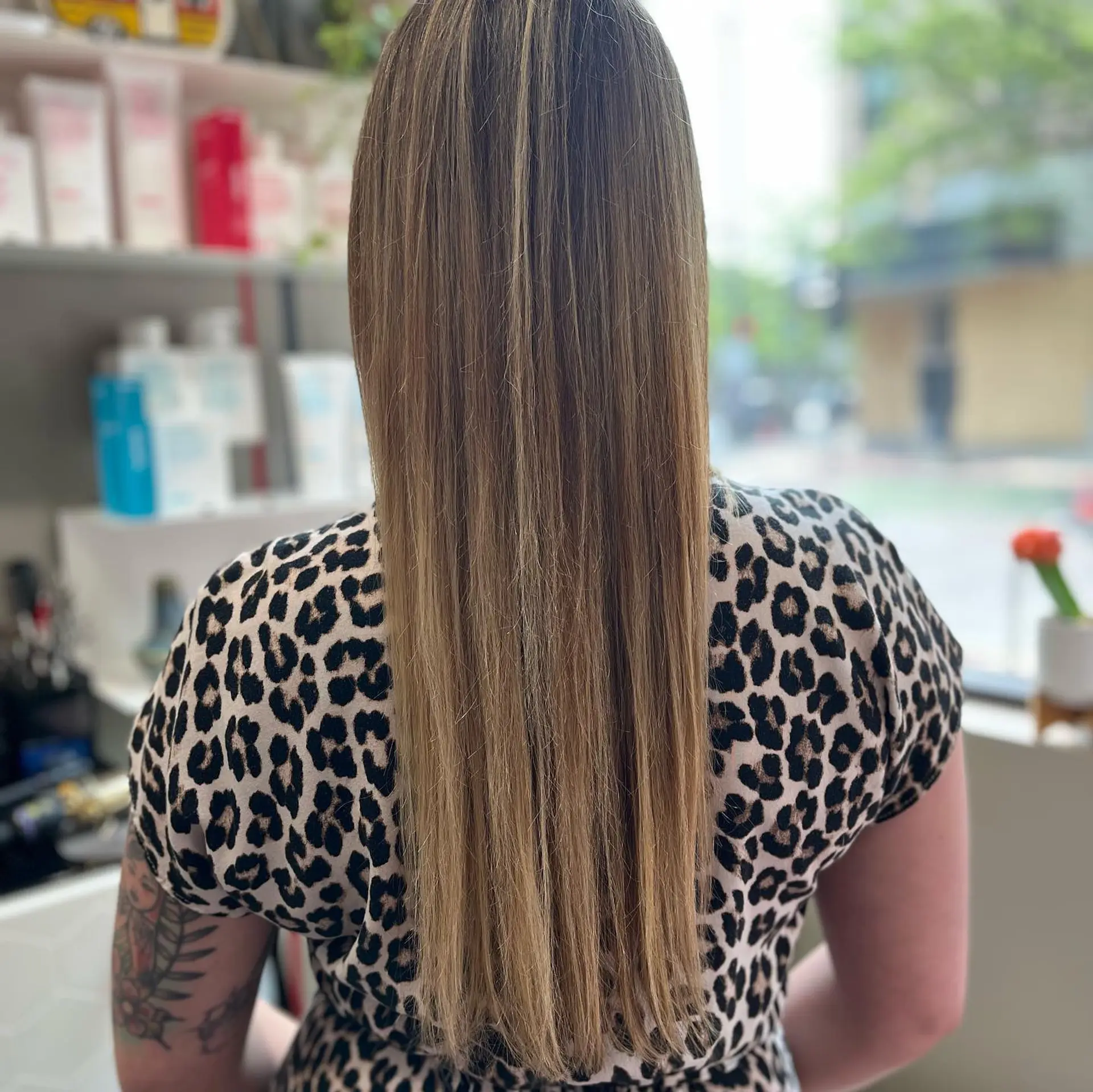 Long, flowing waves with a sun-kissed golden blonde balayage. 3