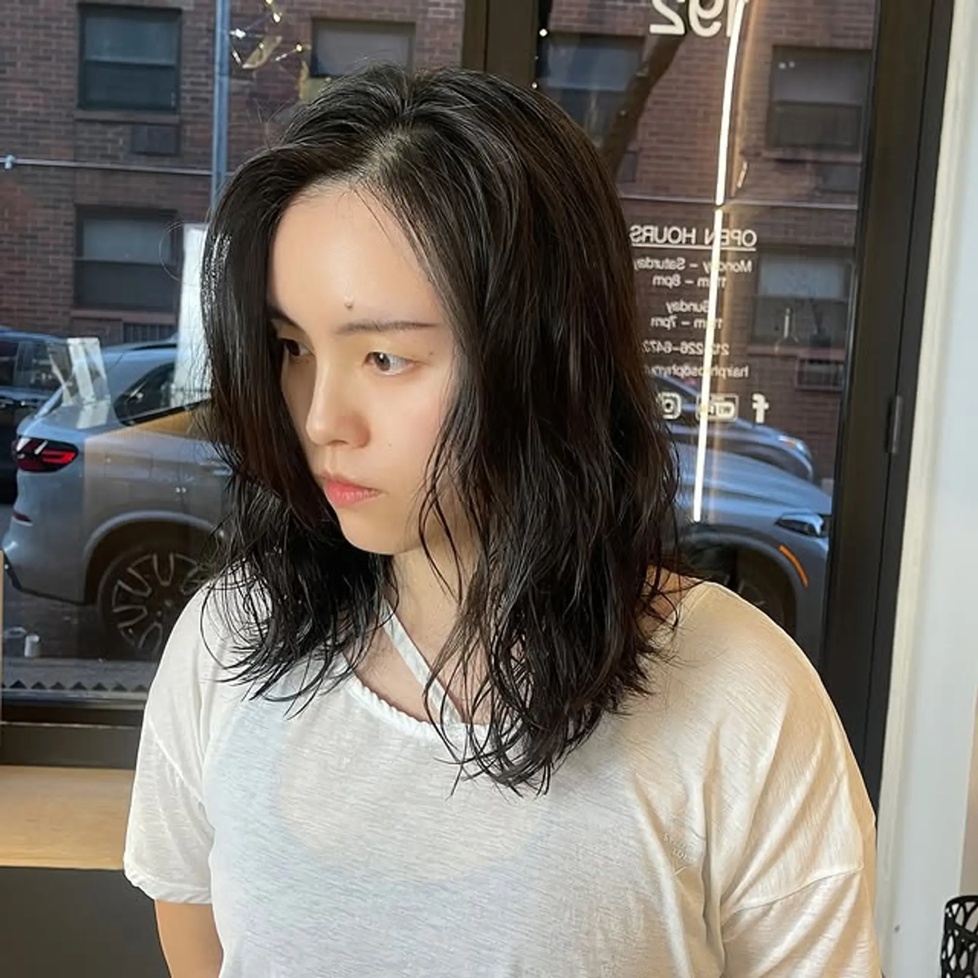 A wavy lob with face-framing layers for a trendy, effortless look. 1