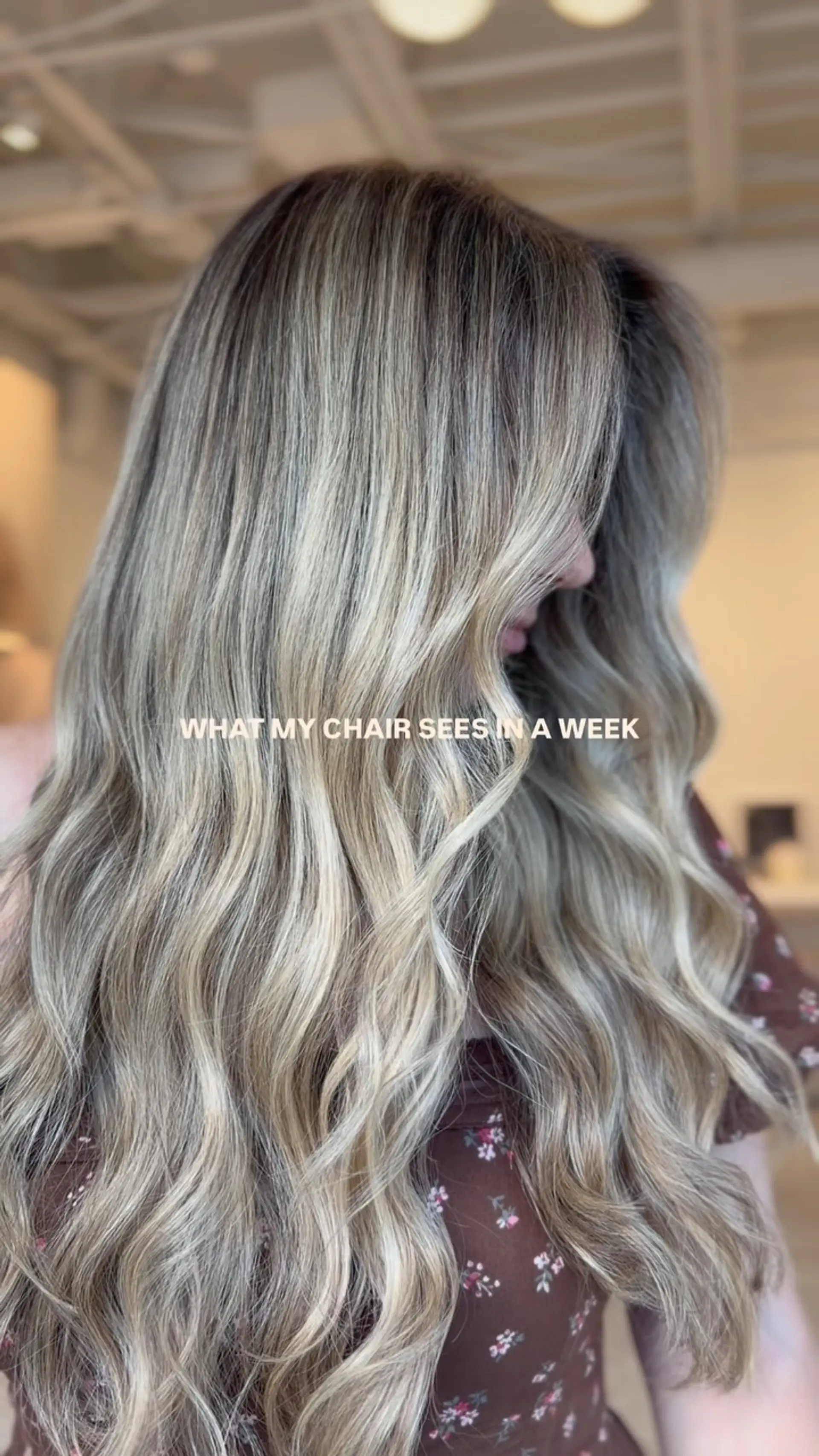 Long dimensional ash blonde hair styled in effortless, cascading loose waves. 1
