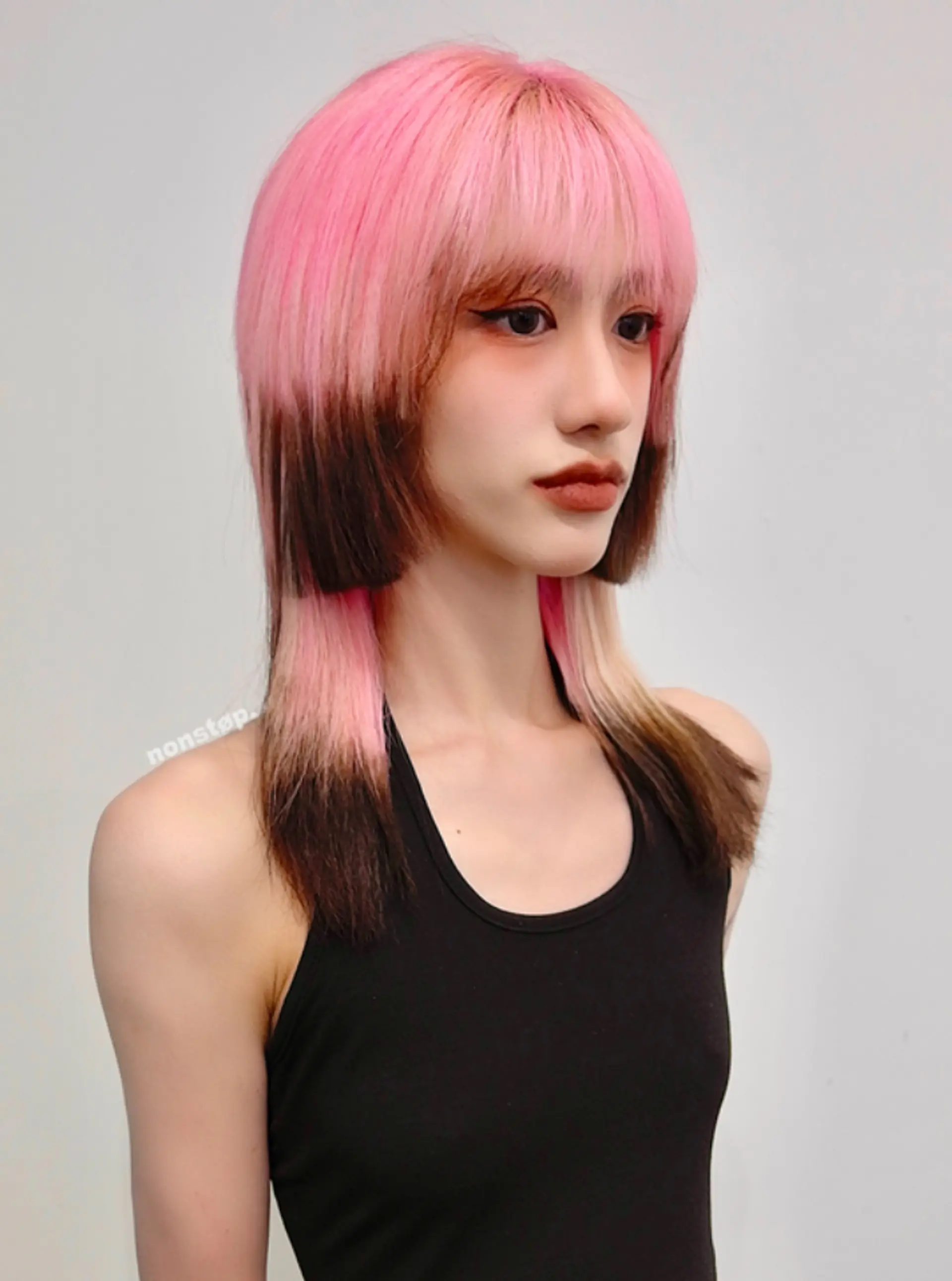 Medium-length straight hairstyle with a pink, black, and blonde ombre effect, featuring a thick fringe and edgy, choppy layers.

(NonstopStyle: by Vincent) 2