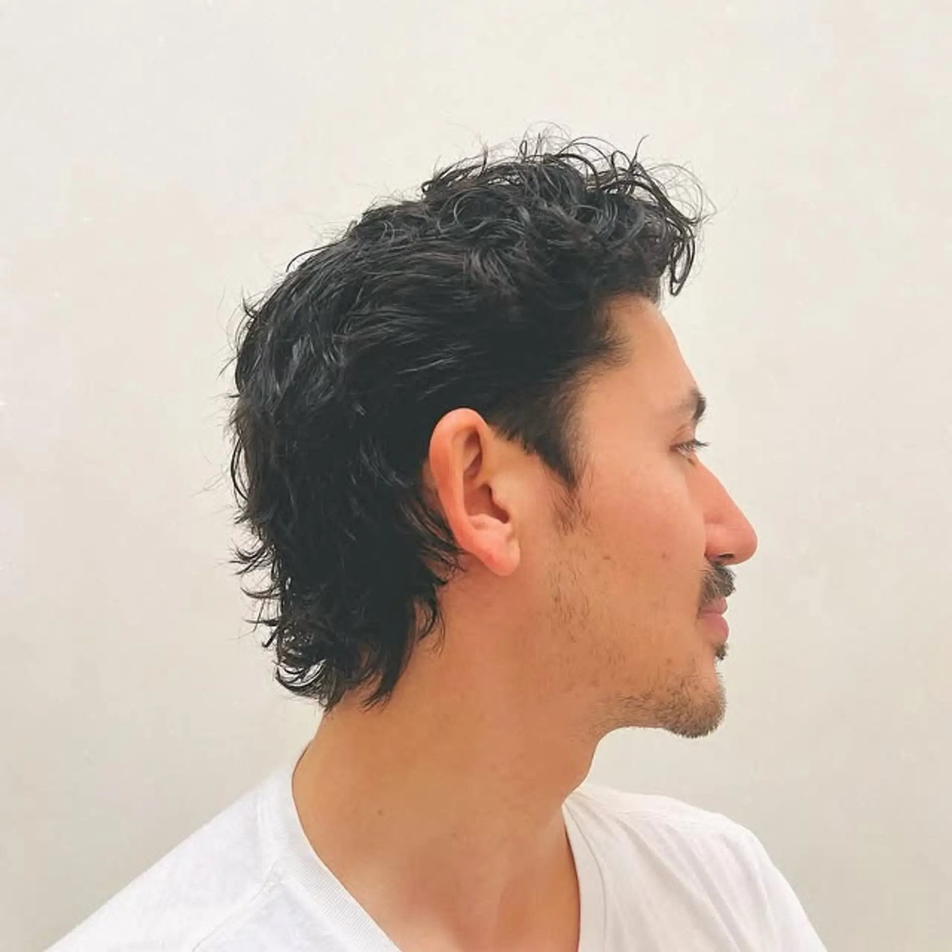 A curly mullet with lots of texture and movement. 1