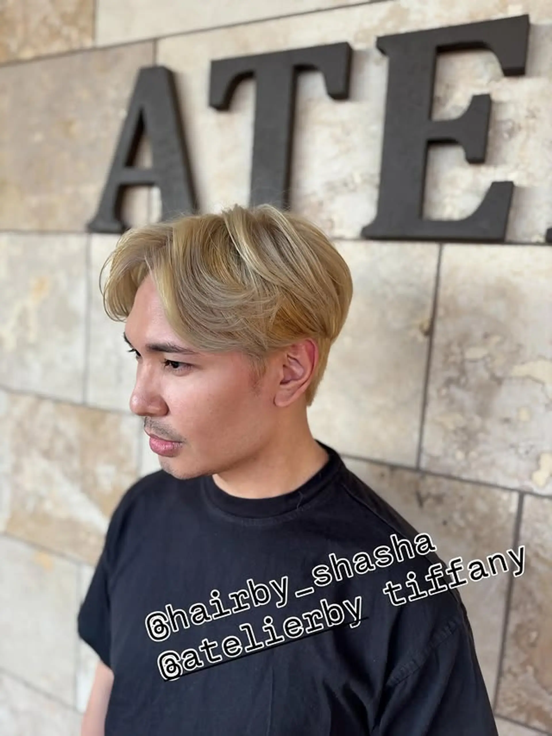 A modern medium-length cut with textured waves and face-framing layers, styled for a relaxed and fashionable look. 1