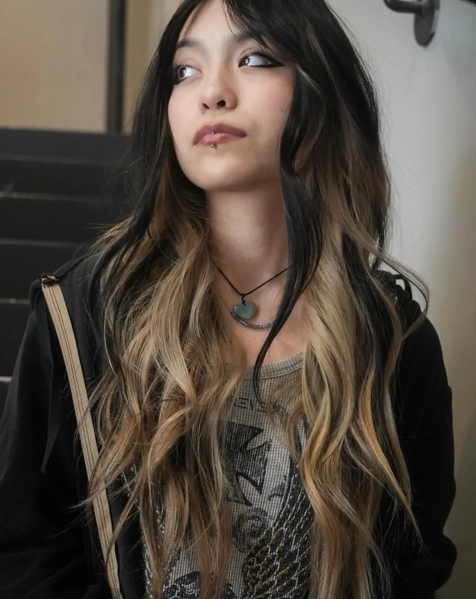 Long wavy hair featuring high-contrast color blocking with dark espresso layers over beige-blonde underlayers. 1