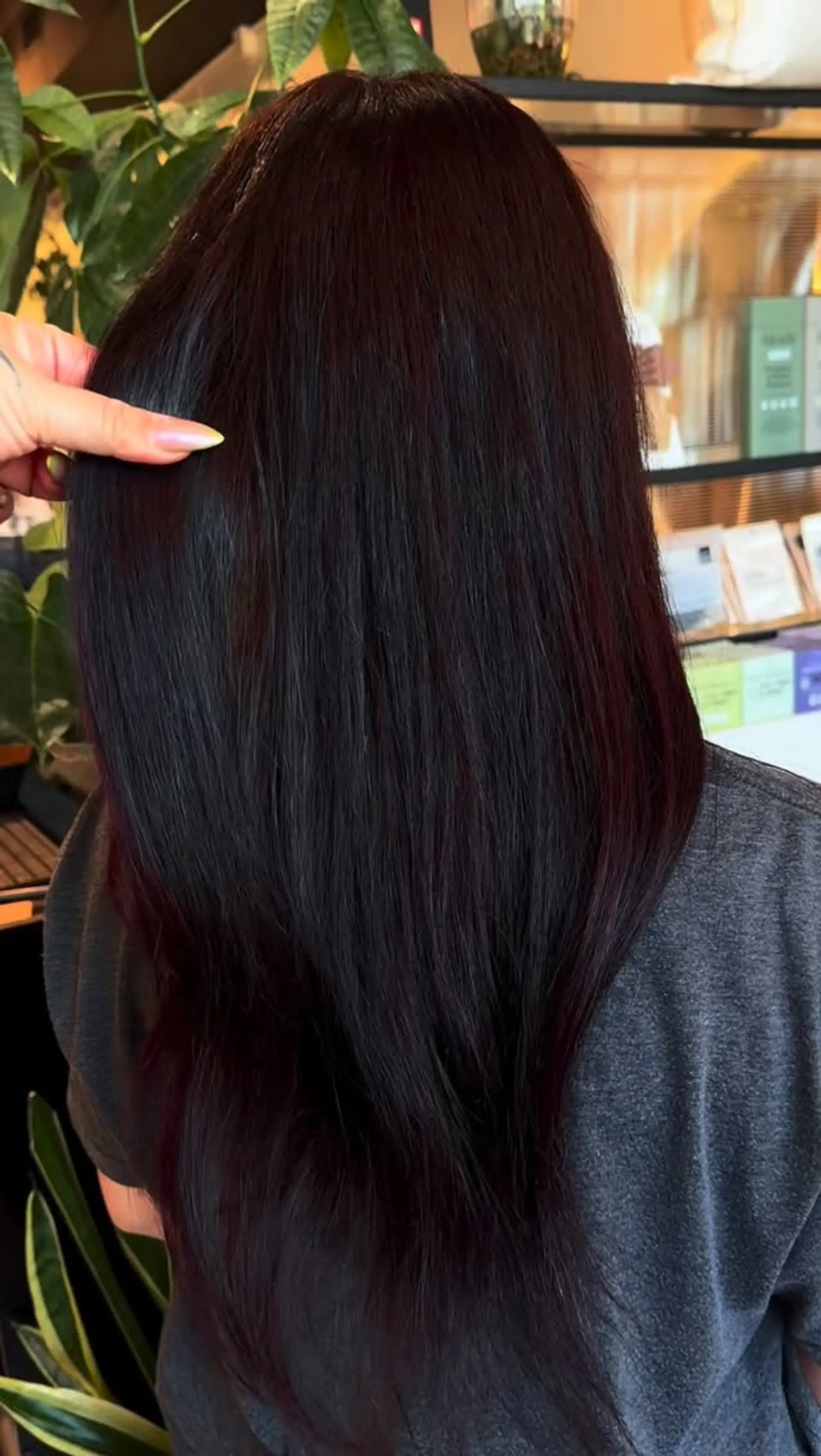 Long straight hair dyed in a rich black-cherry shade with subtle deep red undertones. 1