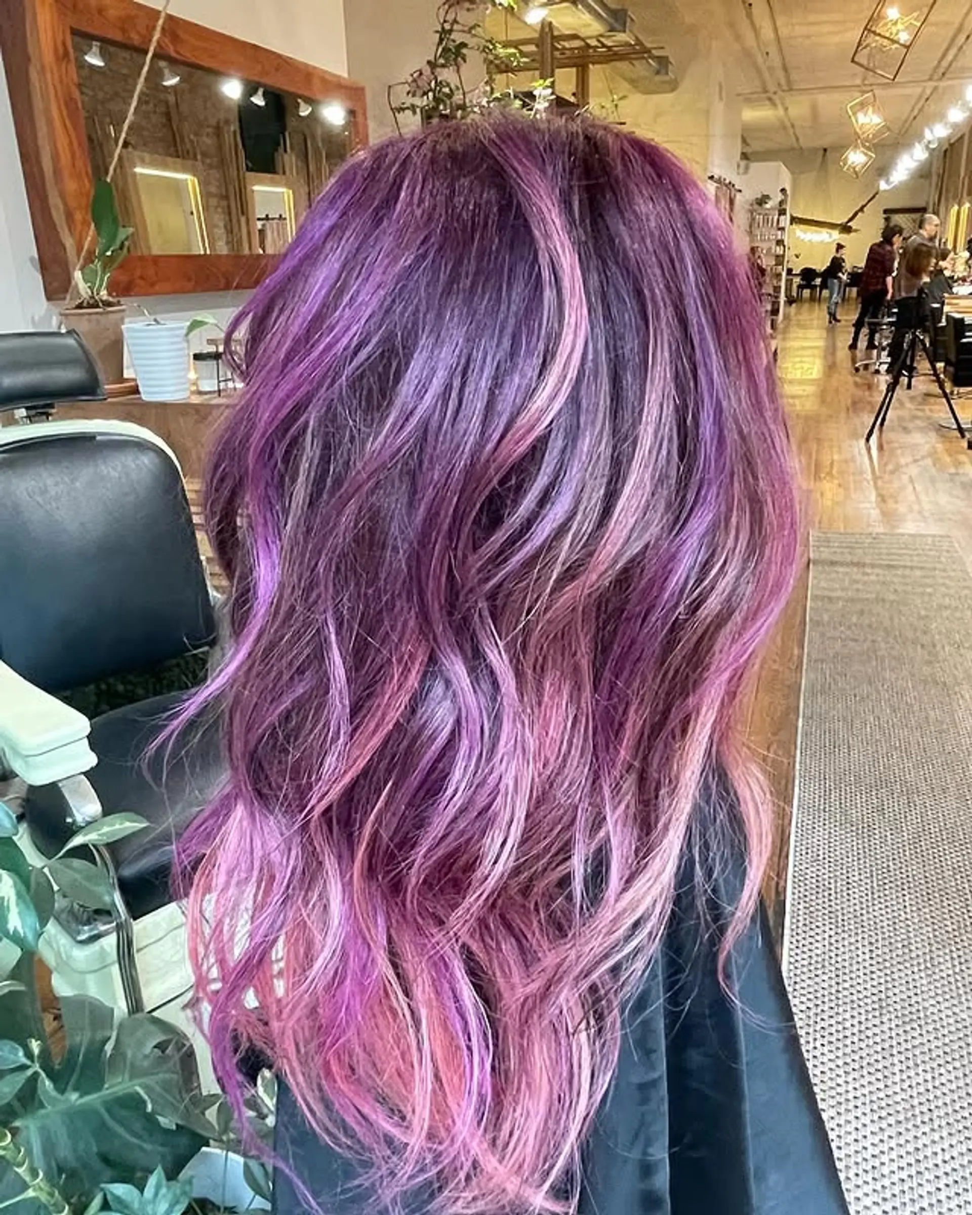 Long, wavy hair with a purple, pink, and lavender balayage. 1