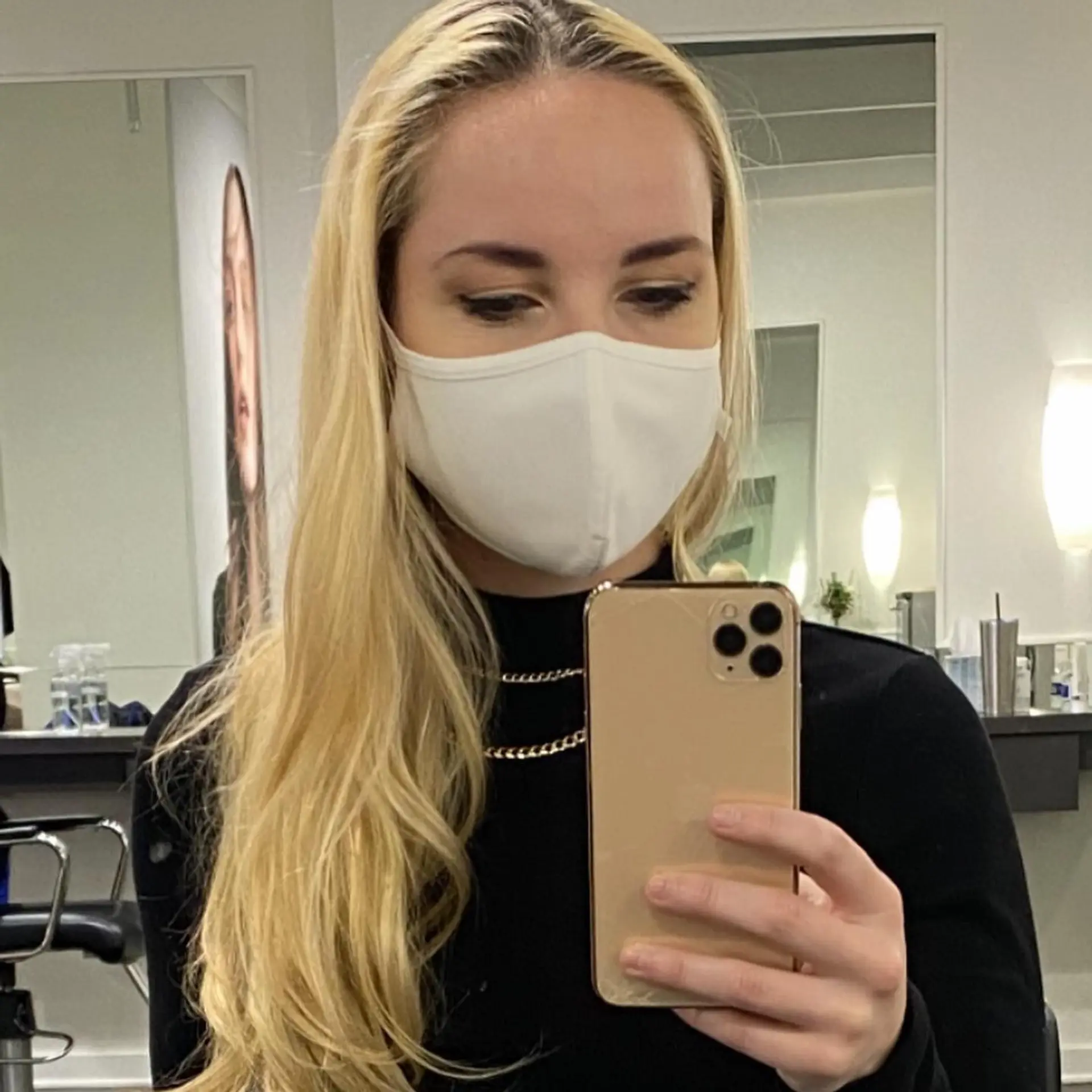 Long, bright platinum blonde hair with soft natural movement and a smooth finish. 1