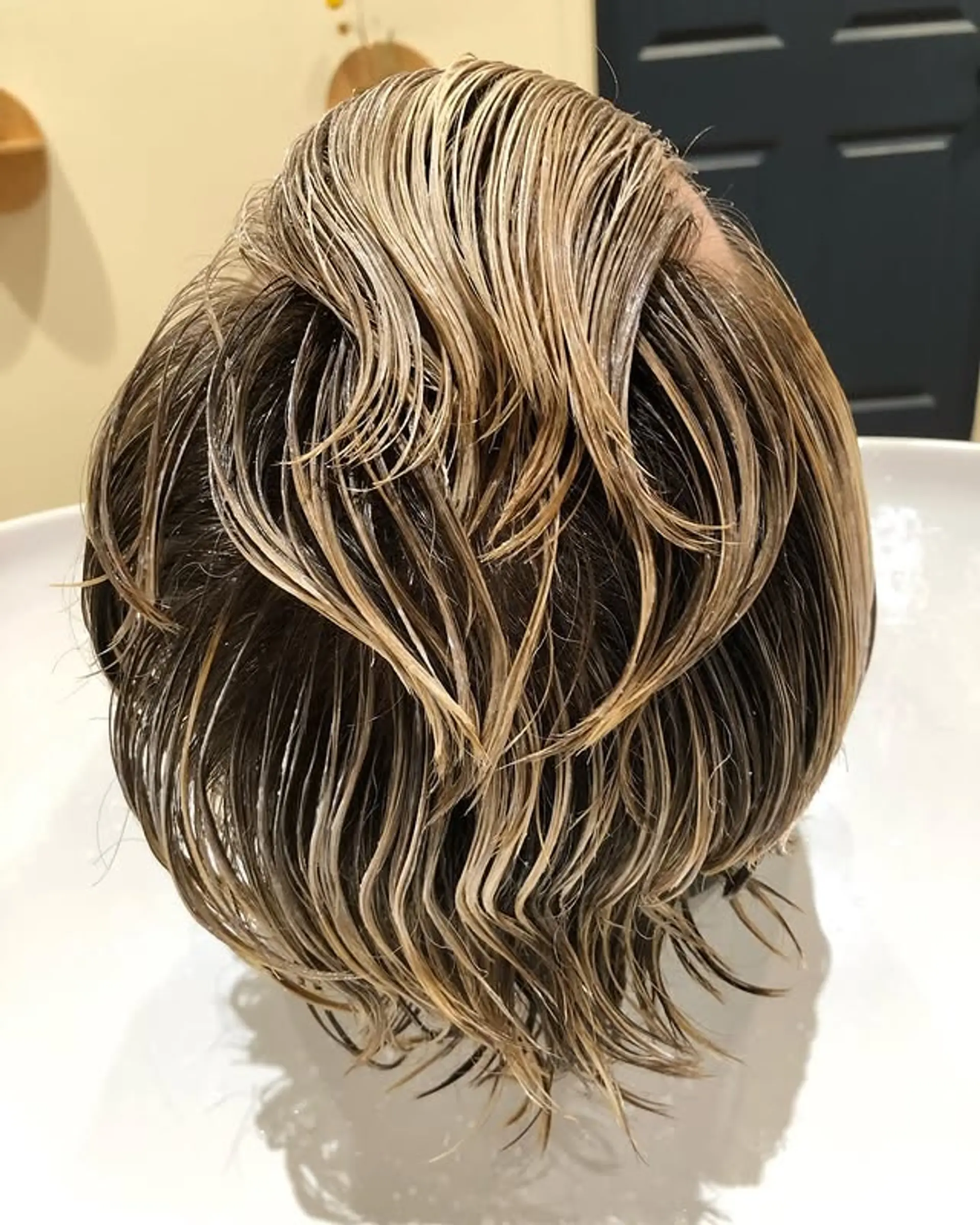 A short, wavy bob with beach waves. 1