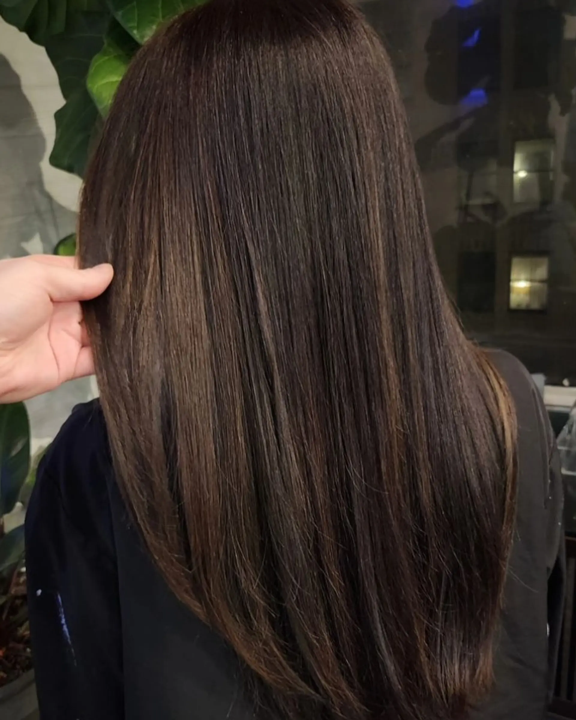 Straight, smooth long dark brunette hair enhanced with seamless chocolate brown balayage highlights. 1