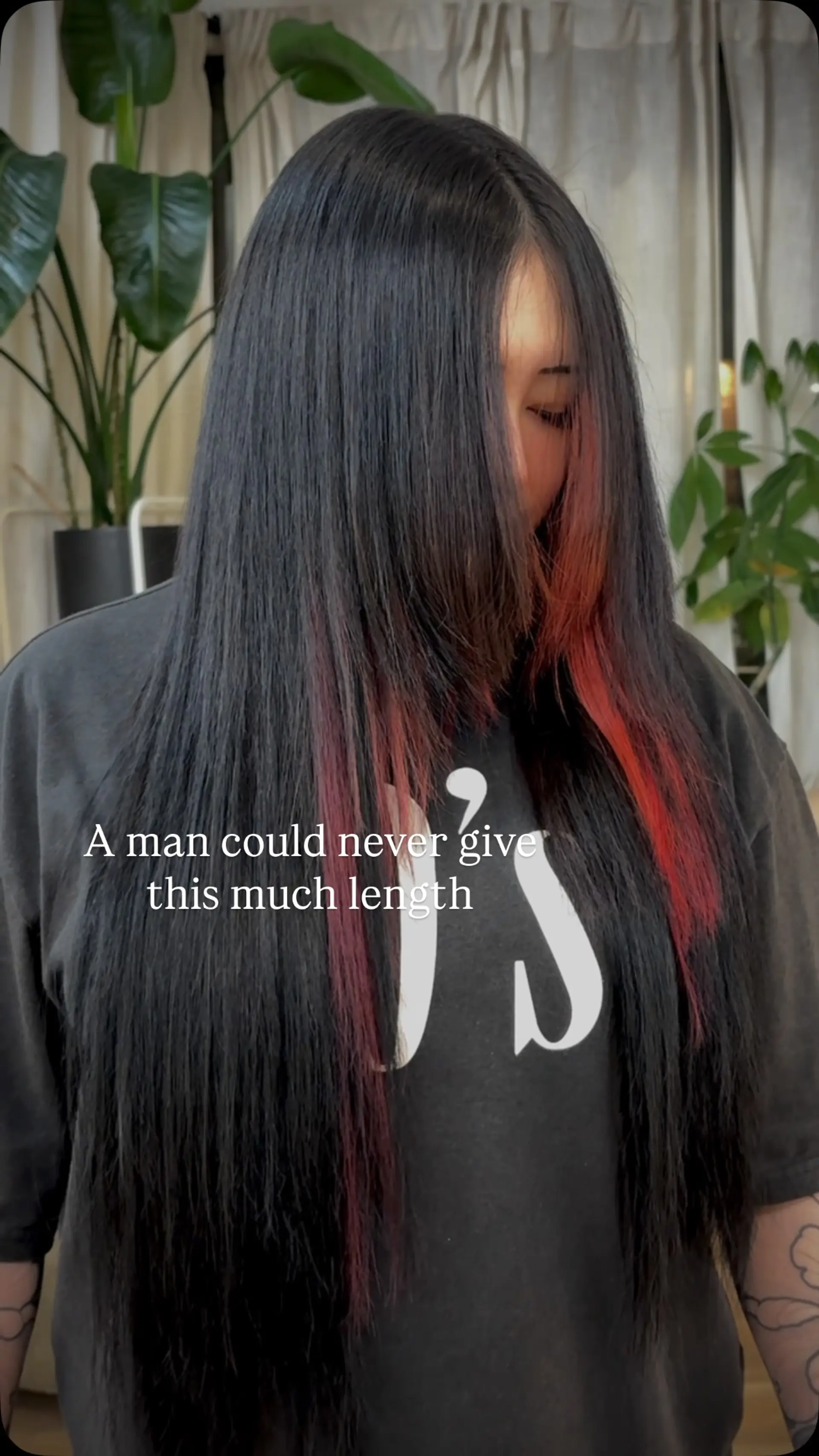 Extra-long straight black hair accented with vibrant crimson red face-framing peekaboo streaks. 1