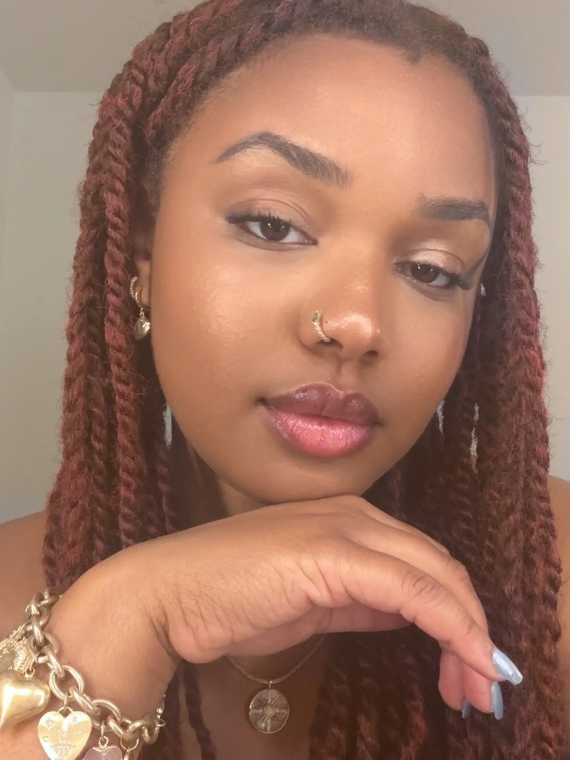 Medium-thick two-strand rope twists in a vibrant reddish-auburn shade. 1