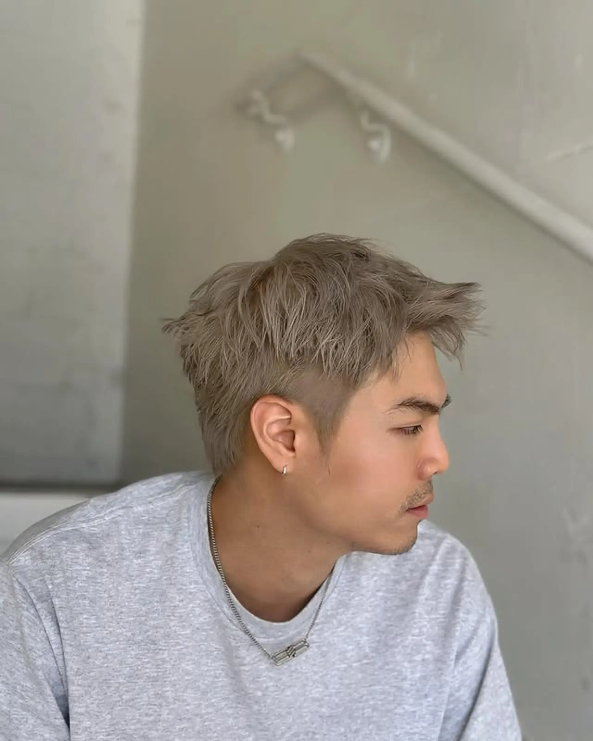 Short textured crop with faded sides. 1