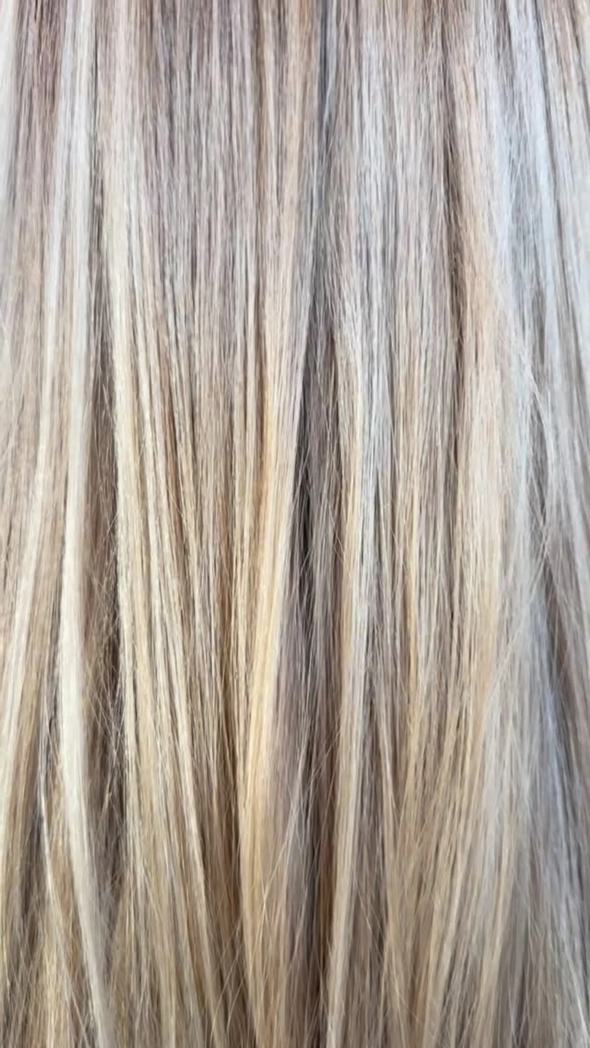 Straight hair featuring finely woven, multi-dimensional blonde highlights for a sun-kissed finish. 1