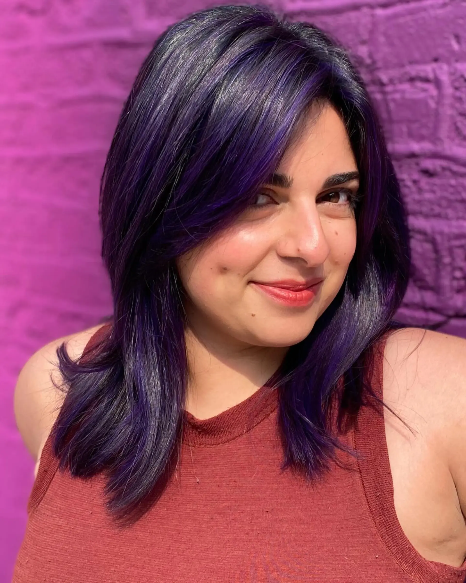 Medium length straight hair with a vibrant amethyst color. 1
