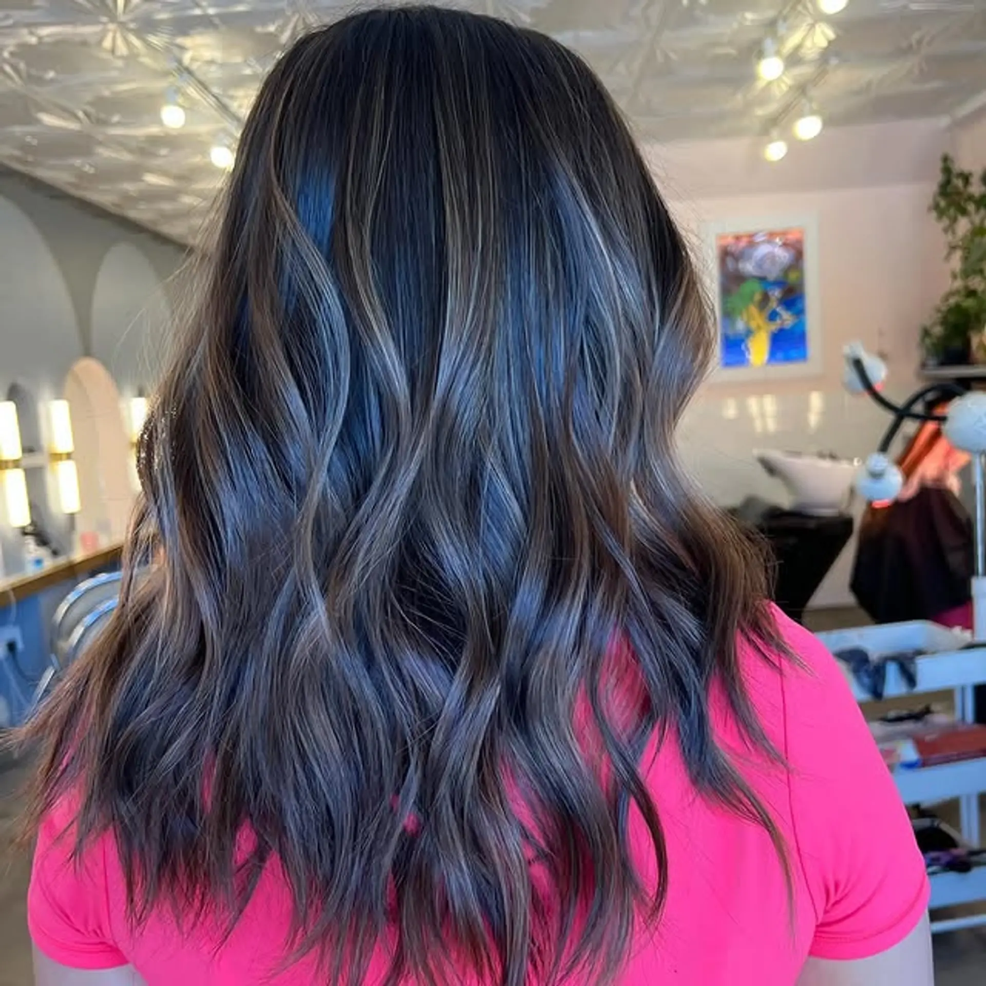 Long, wavy hair with bronzed babylights. 1