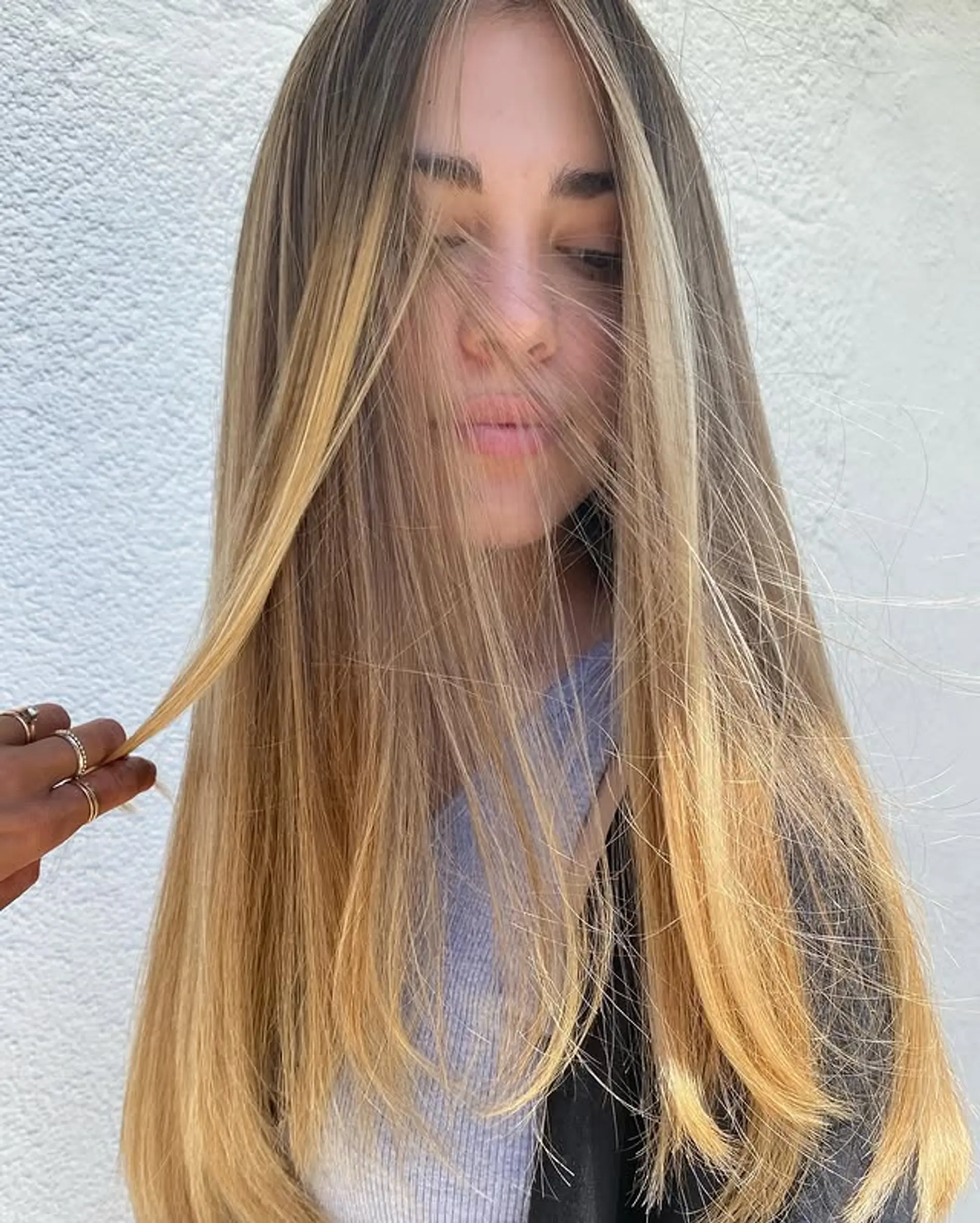 Long, straight hair with a caramel blonde balayage and face-framing highlights. 1