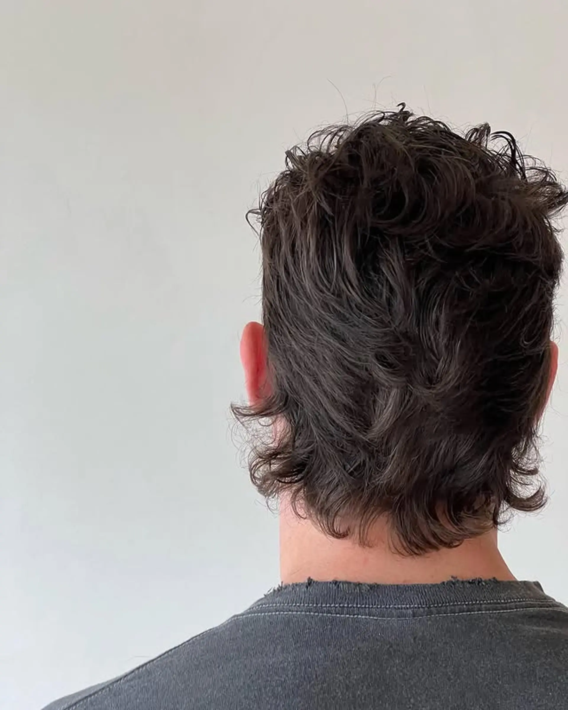 A trendy mullet shag with a layered texture. 1