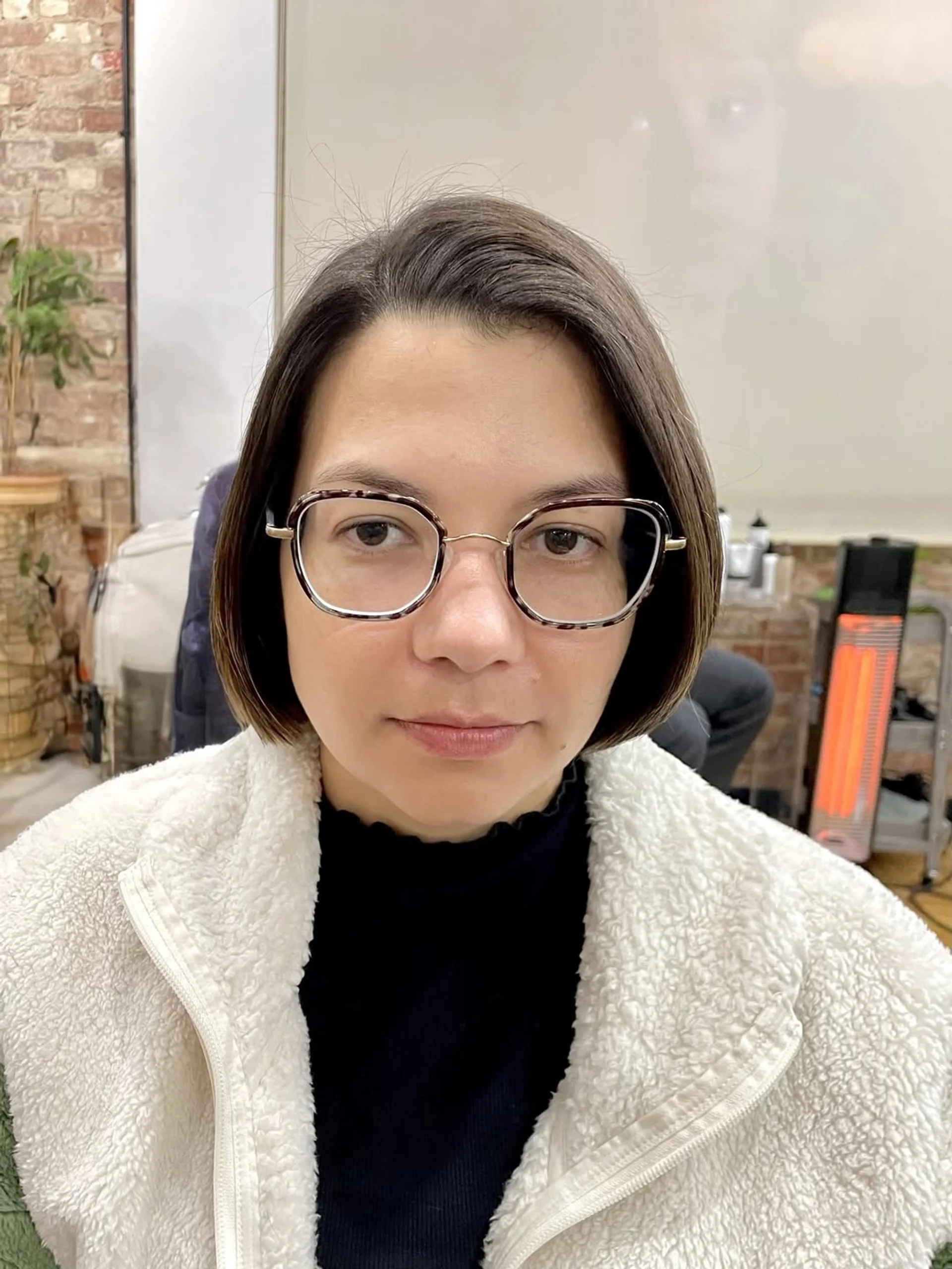 Sleek chin-length blunt bob with a clean line, representing the minimalist Japanese bob trend in 2026 - Preview 2