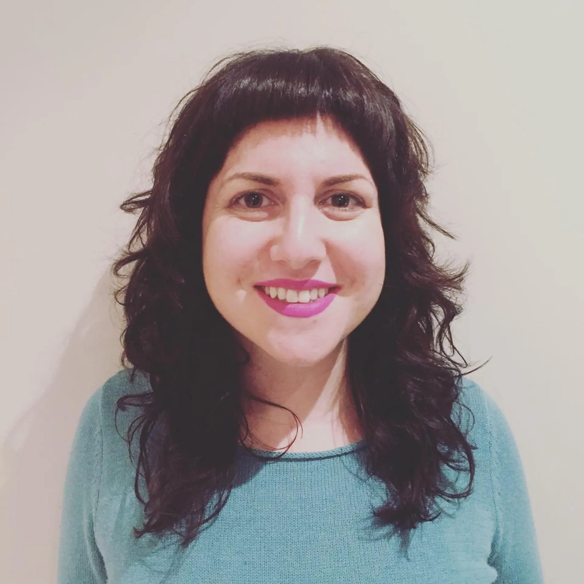 A wavy shag haircut with choppy bangs and lots of layers for added texture. 1