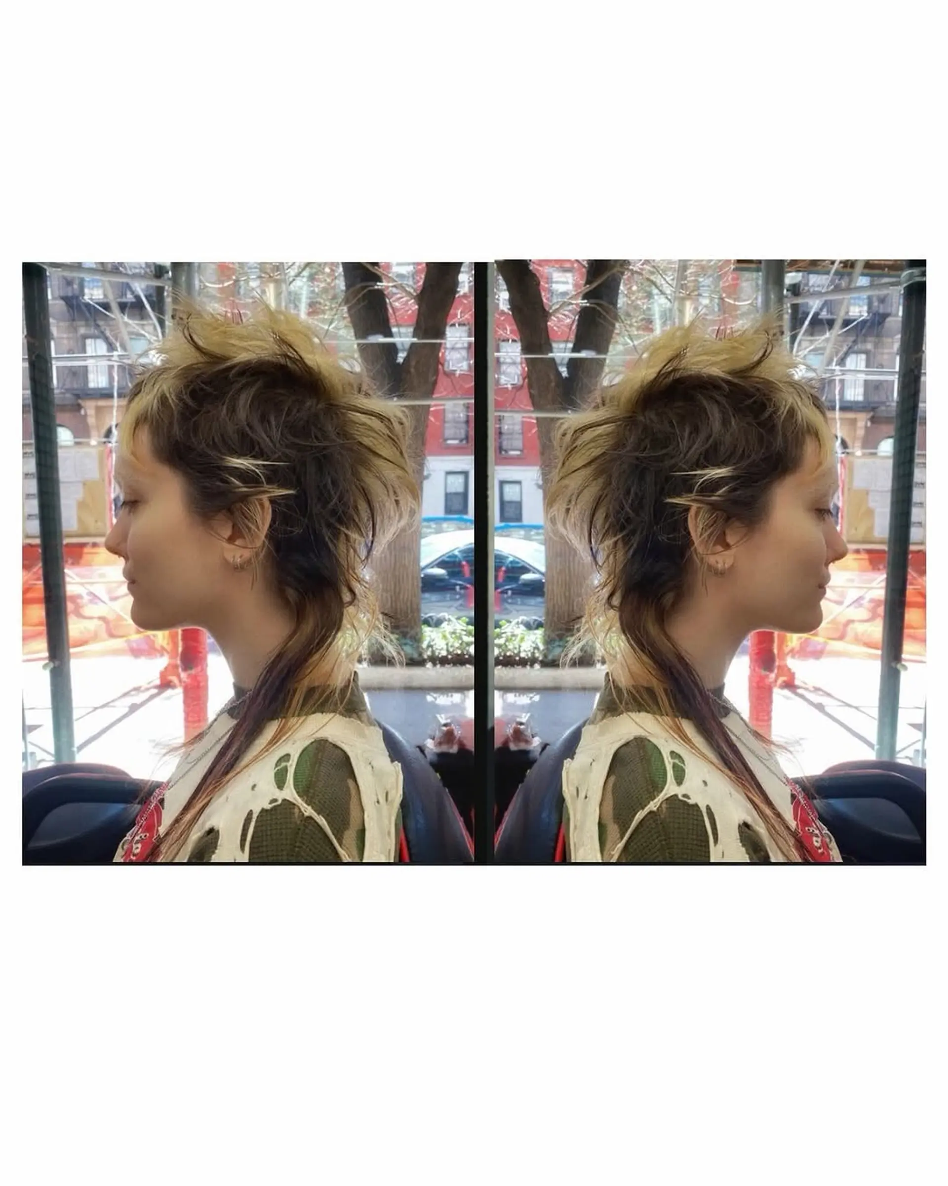 A trendy, textured wolf-cut mullet characterized by short, voluminous layers on top and crown, transitioning into a long, wispy tail, finished with a high-contrast two-toned color application. 1