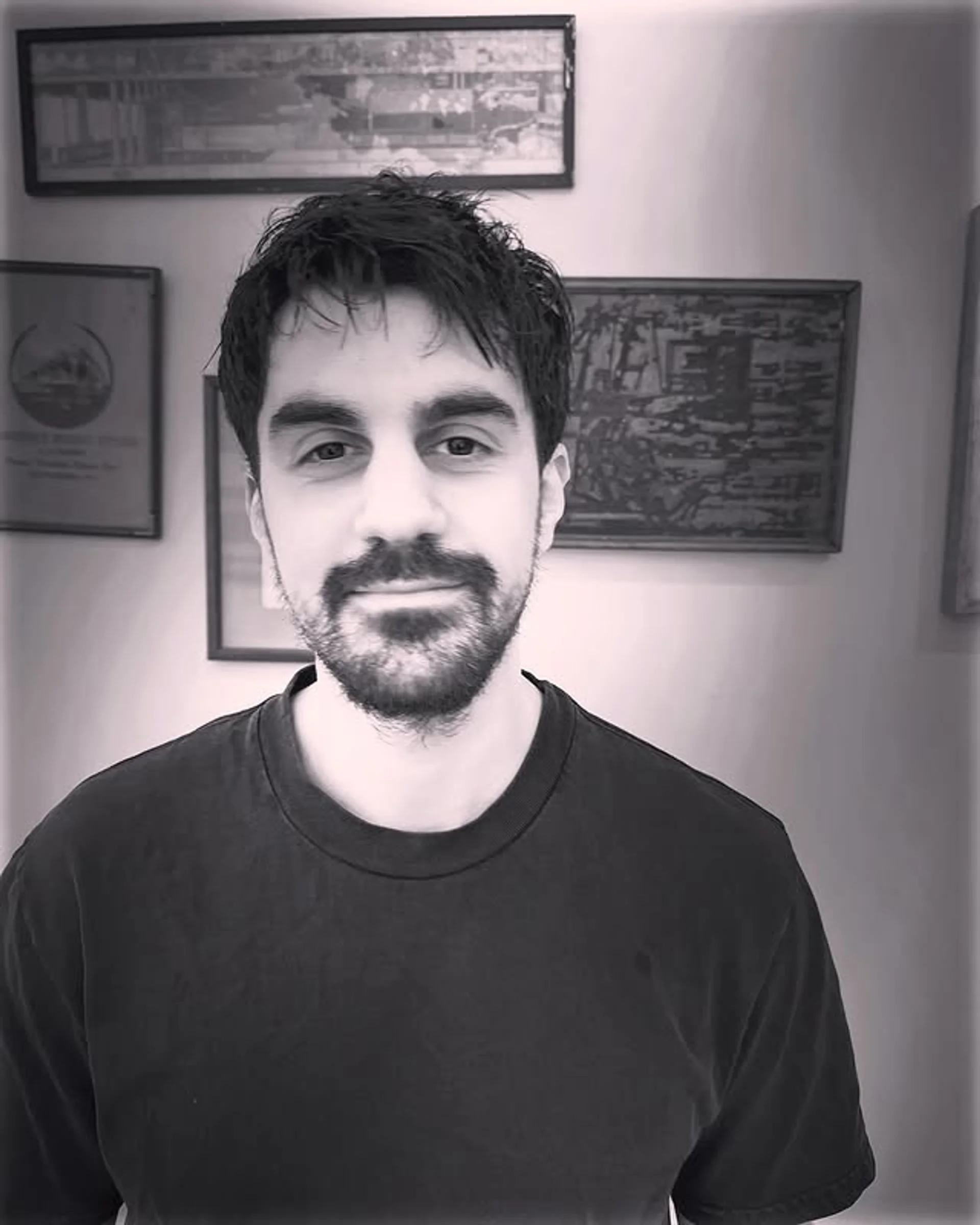 A modern men's textured crop with a perfectly blended taper fade, showcasing natural movement. - Preview 2